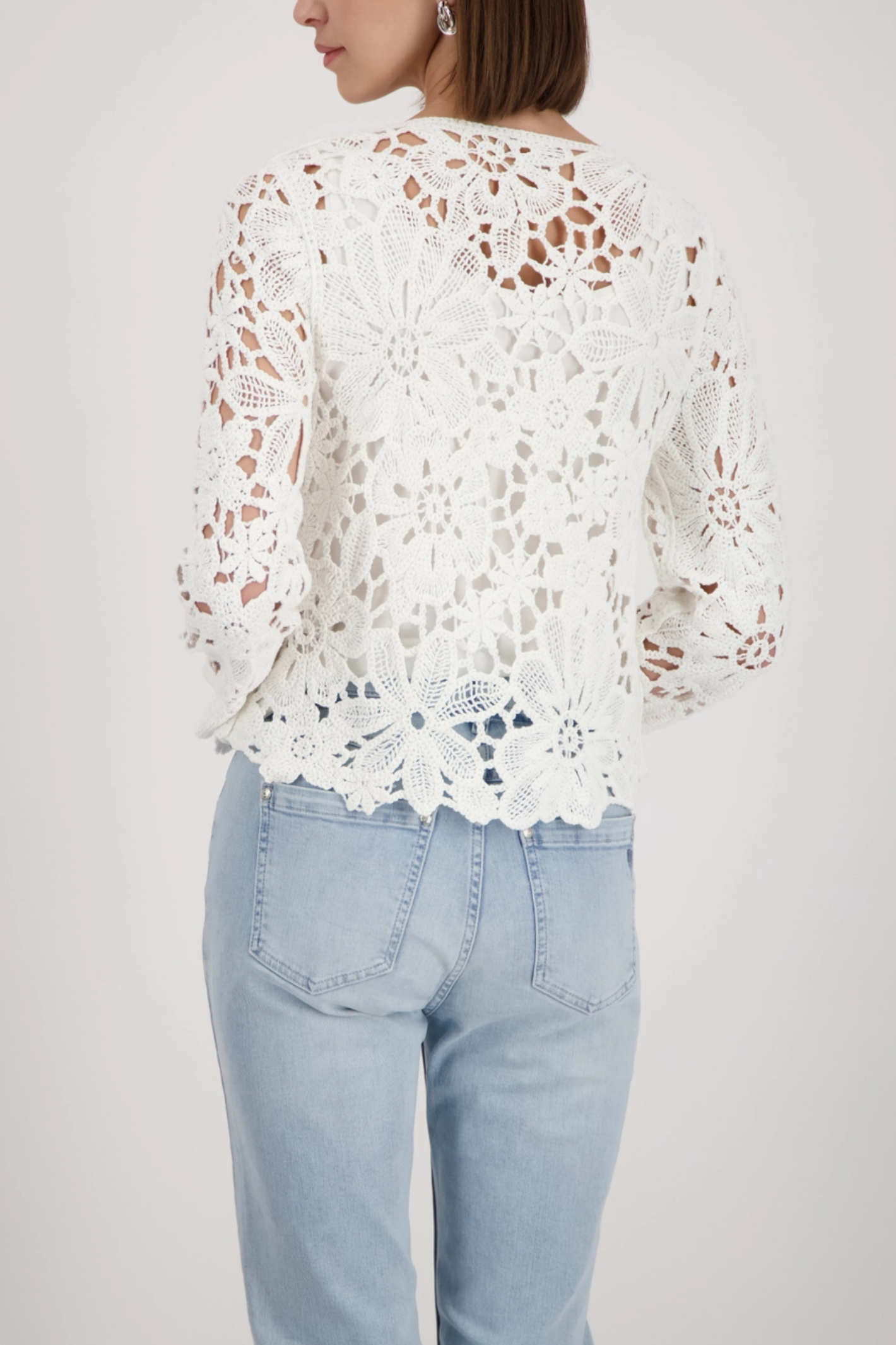 Woman wearing Monari 410237 Cornelly Crochet Pattern Jumper Off White by Monari, shop Monari at Dotique.