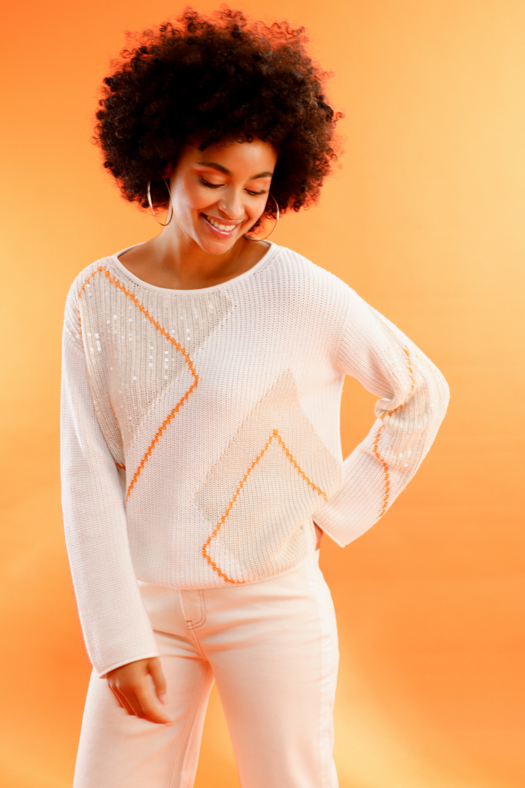 Model wearing Monari 410281 Diamond Pattern Sequin Jumper Off White by Not specified, shop Not specified at Dotique.