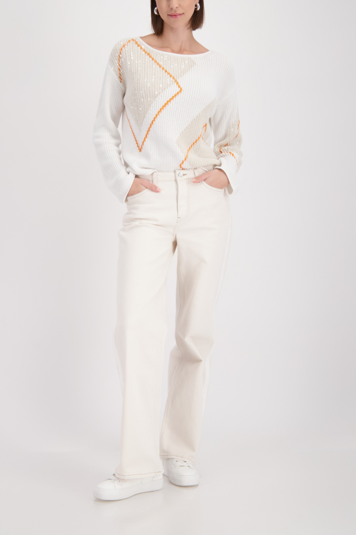 Model wearing Monari 410281 Diamond Pattern Sequin Jumper Off White by Not specified, shop Not specified at Dotique.