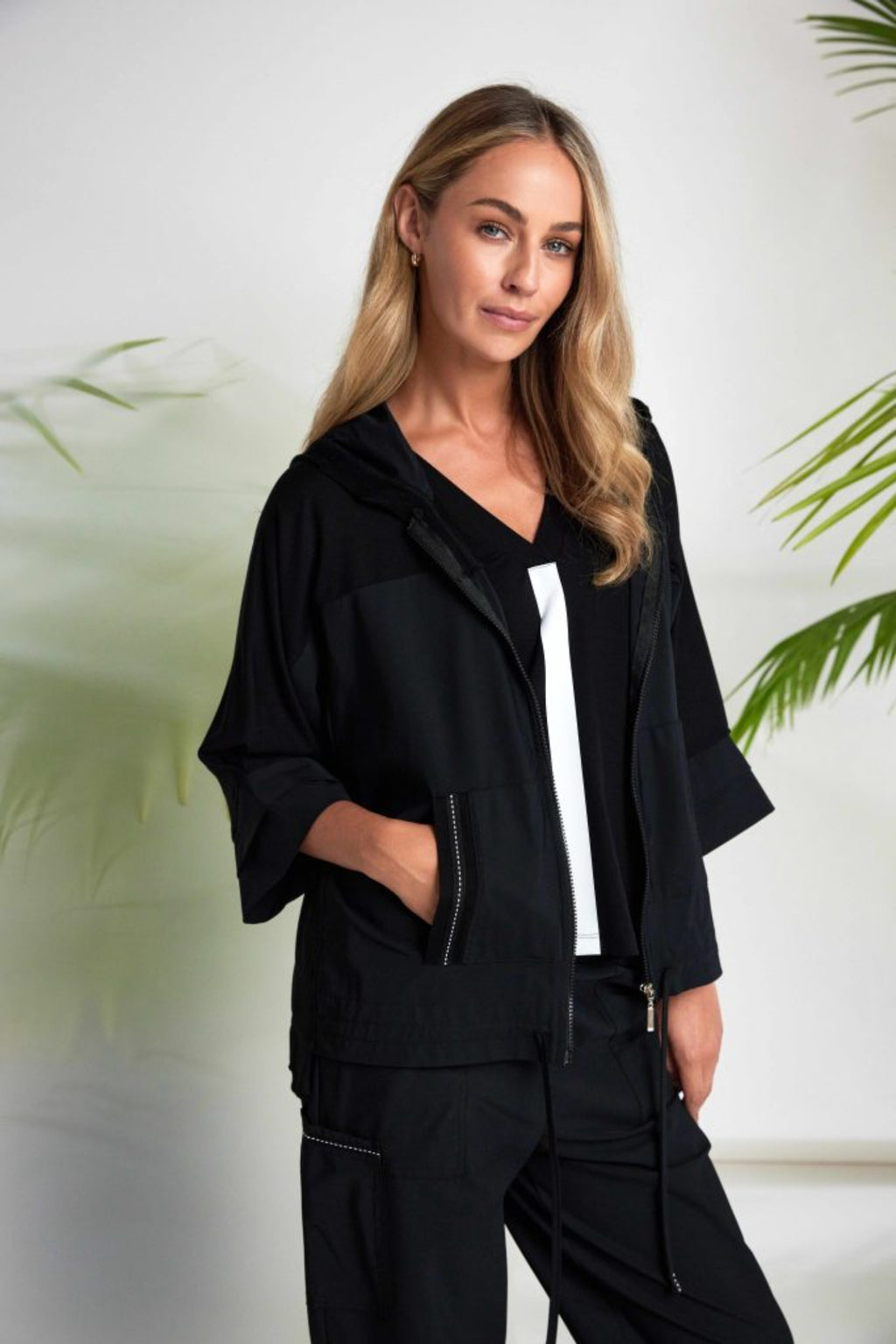 Model wearing Naya NAS26196 Drawstring Hem Zip Jacket With Contrast Panels Black by Naya Shop Naya at Dotique