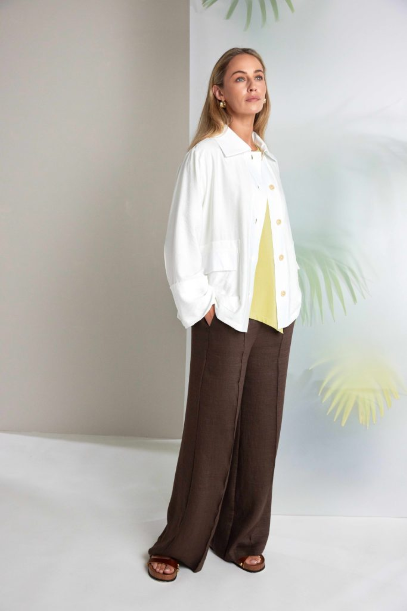 Naya Oasis jersey top with a relaxed fit and cut-out hem detail. Soft, flattering and easy to wear. Shop this fresh colour at Dotique.