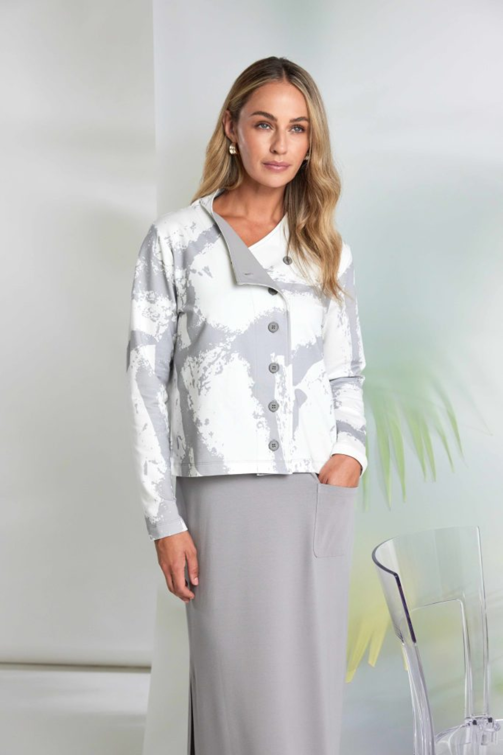 Soft dove grey Naya jersey dress with wide straps, side slit and patch pocket. Flattering, comfortable and easy to wear. Shop at Dotique.