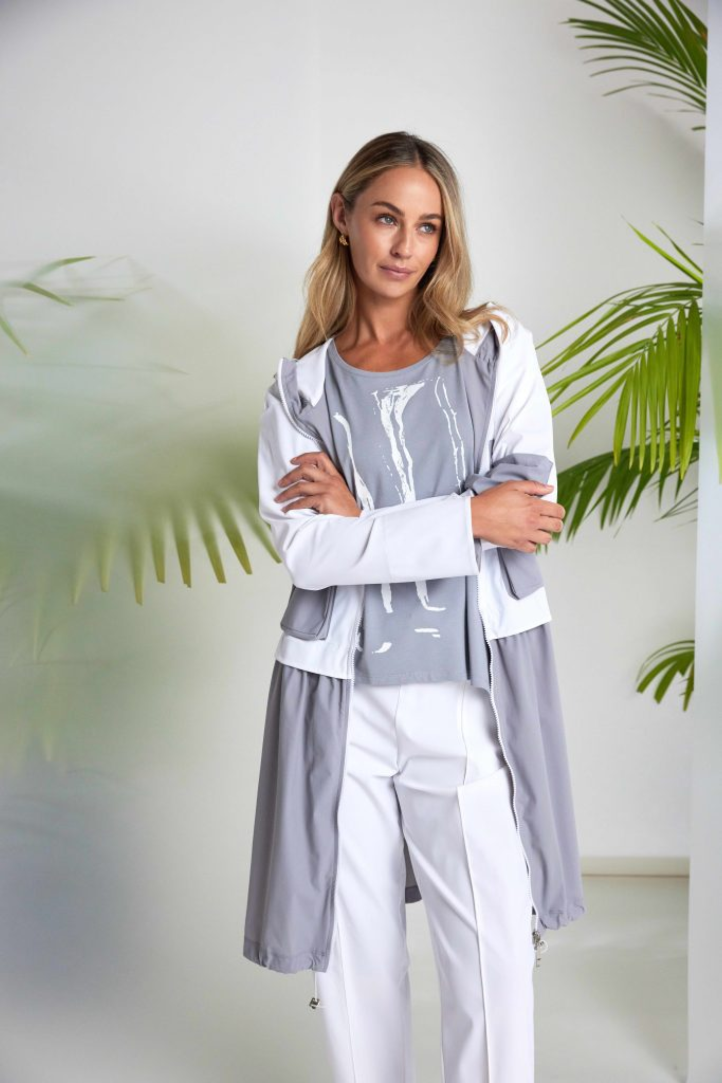 Dove grey and white Naya print top with contrast side panel and asymmetric hem. Soft jersey, flattering and easy to wear. Shop at Dotique.