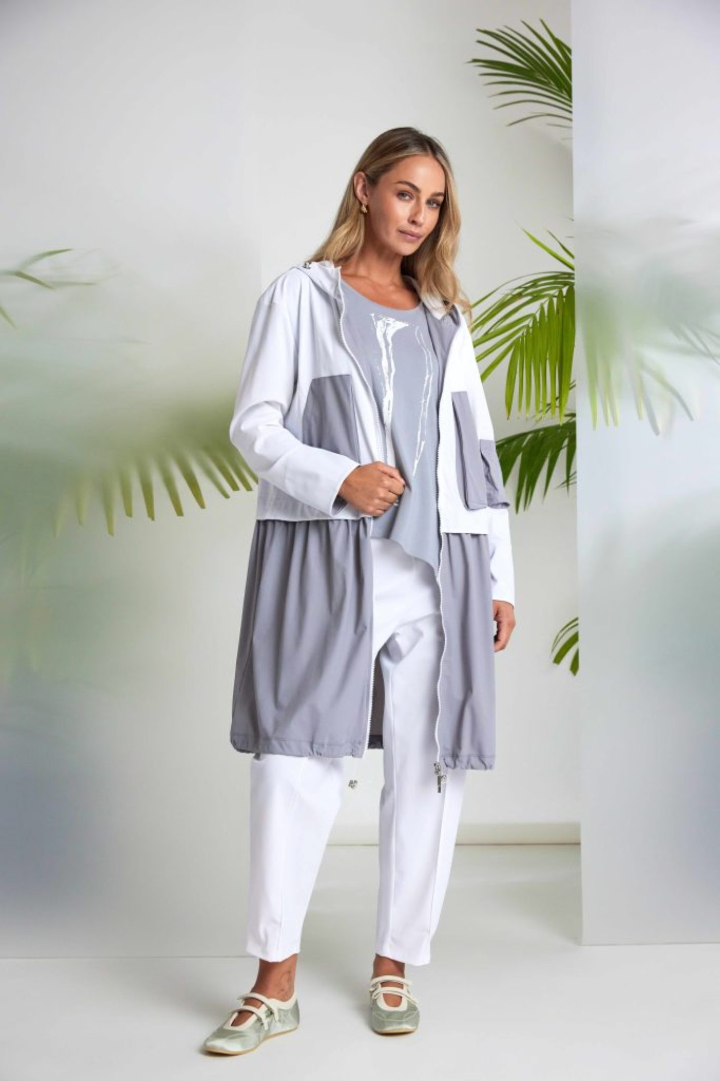 Dove grey and white Naya print top with contrast side panel and asymmetric hem. Soft jersey, flattering and easy to wear. Shop at Dotique.