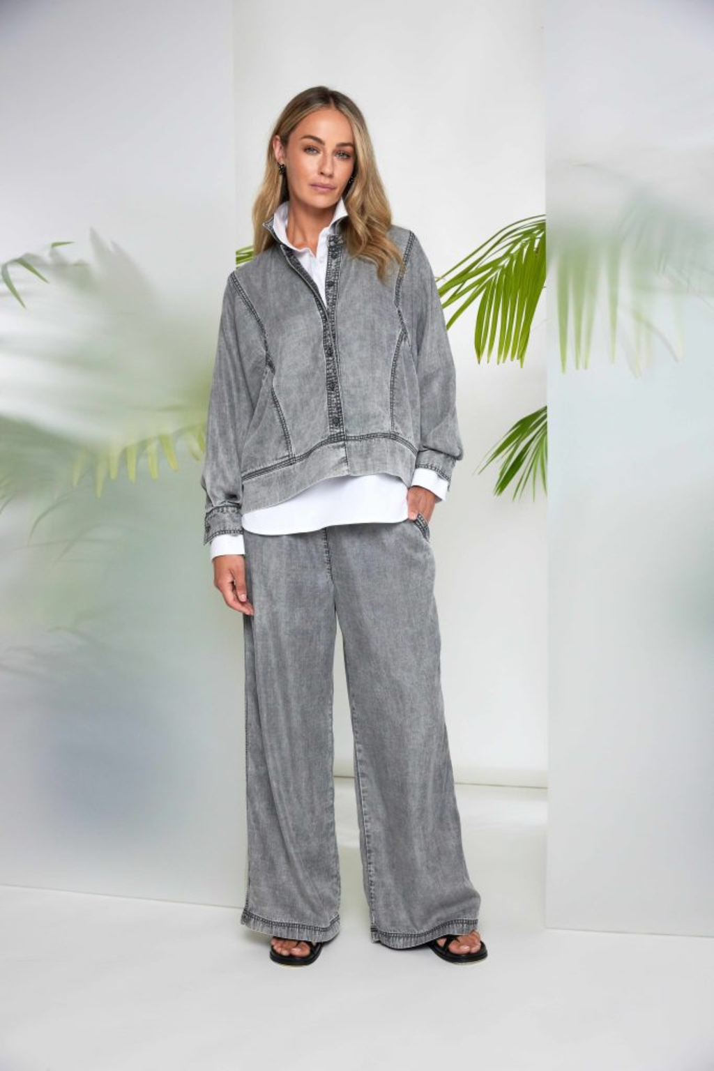 Model wearing Naya NAS26140 Granite Grey Washed Effect Jacket by Naya, styled with matching pants, shop Naya at Dotique