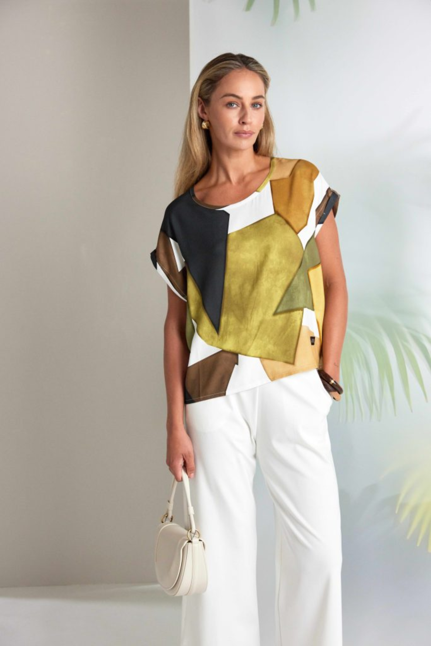 Model wearing Naya NAS26150 Oasis Multicolour Print Top by Naya, shop Naya at Dotique in relaxed abstract colourblock style