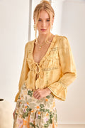 Woman wearing Nekane Faro Yellow Rayon Blouse with Long Sleeves with Flounces and Frills by NKN Nekane, shop NKN Nekane at Dotique