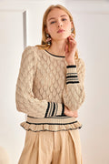 Woman wearing NKN Nekane Mutem Sand Bicolour Jumper by NKN Nekane, shop the vendor at Dotique for stylish knitwear.