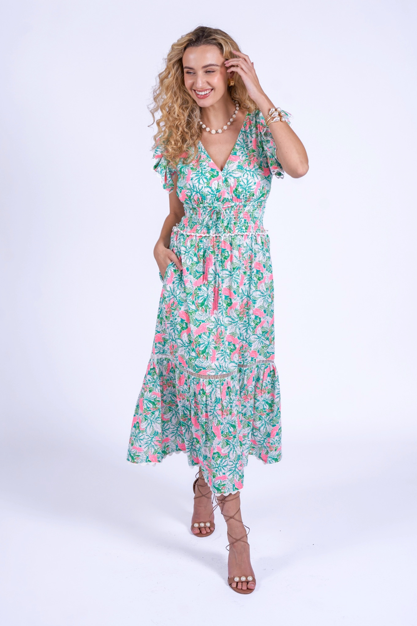 Model wearing New Day Originals Misha Pink Parrot dress by New Day Originals, shop New Day Originals at Dotique