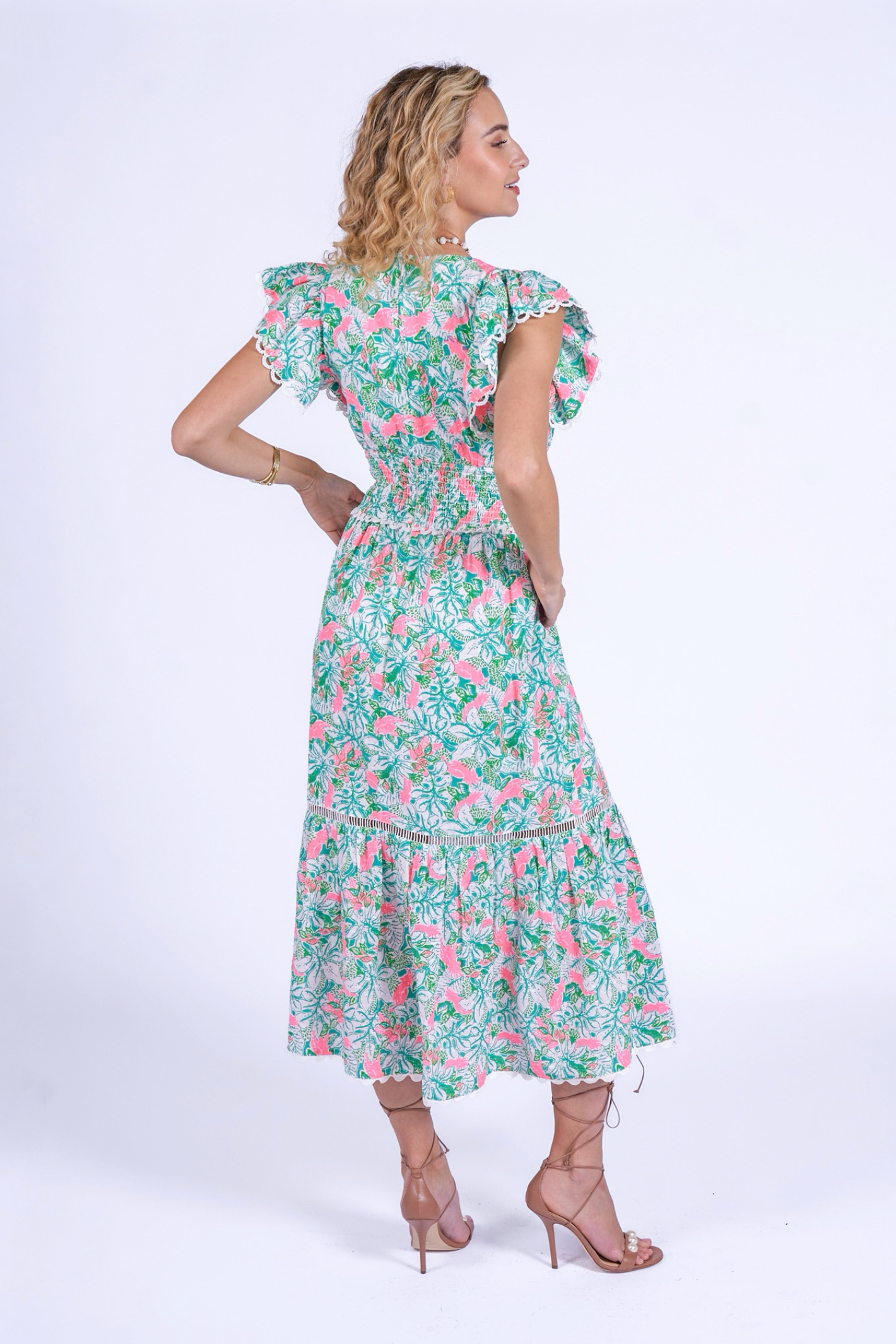 Woman wearing New Day Originals Misha Pink Parrot dress by New Day Originals, shop New Day Originals at Dotique