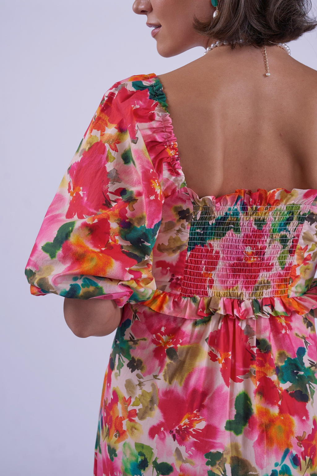 Back view of colorful floral dress with puff sleeves by New Day Originals Universe Dress Summer Bouquet, shop New Day Originals at Dotique
