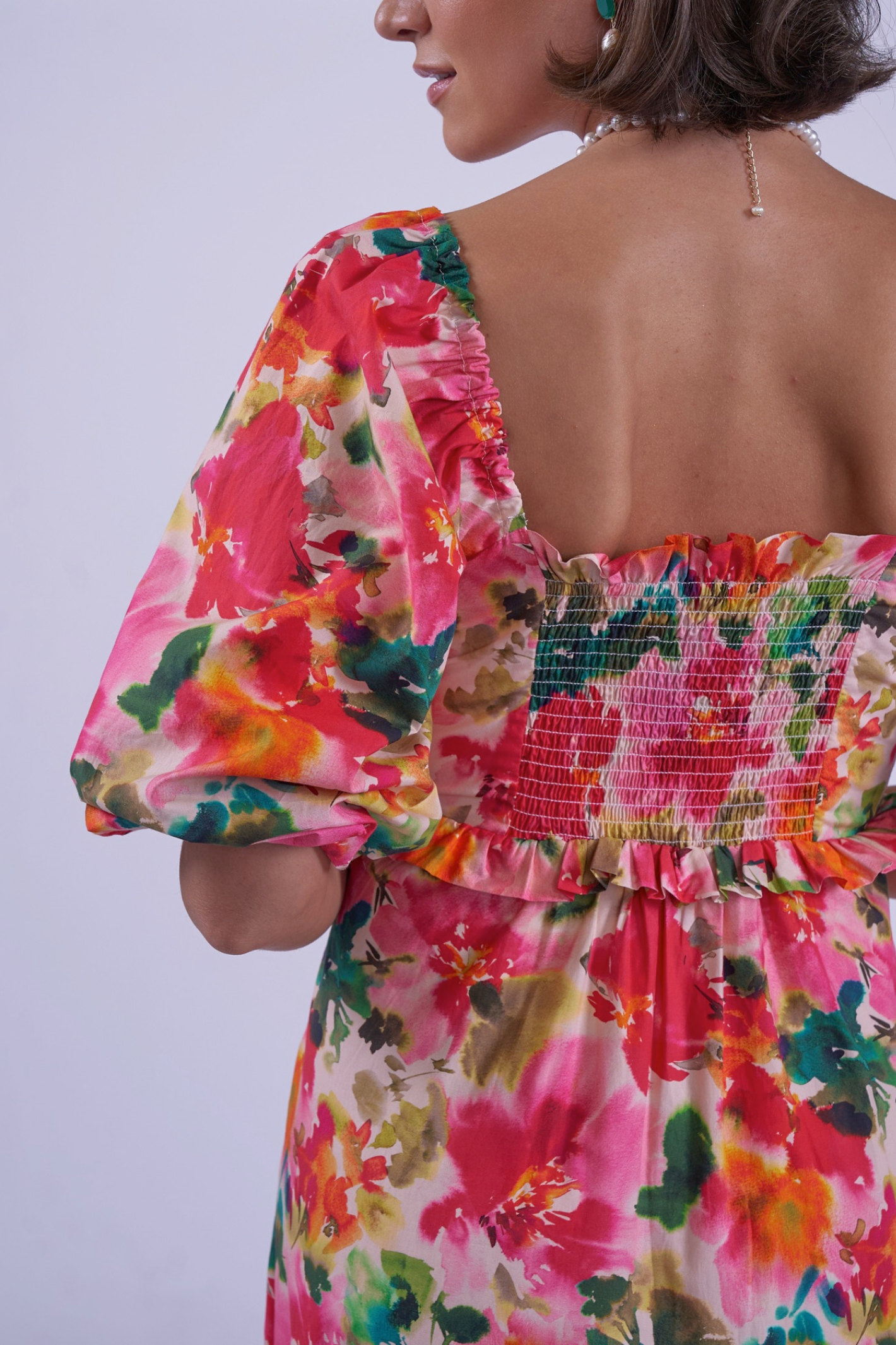 Back view of colorful floral dress with puff sleeves by New Day Originals Universe Dress Summer Bouquet, shop New Day Originals at Dotique