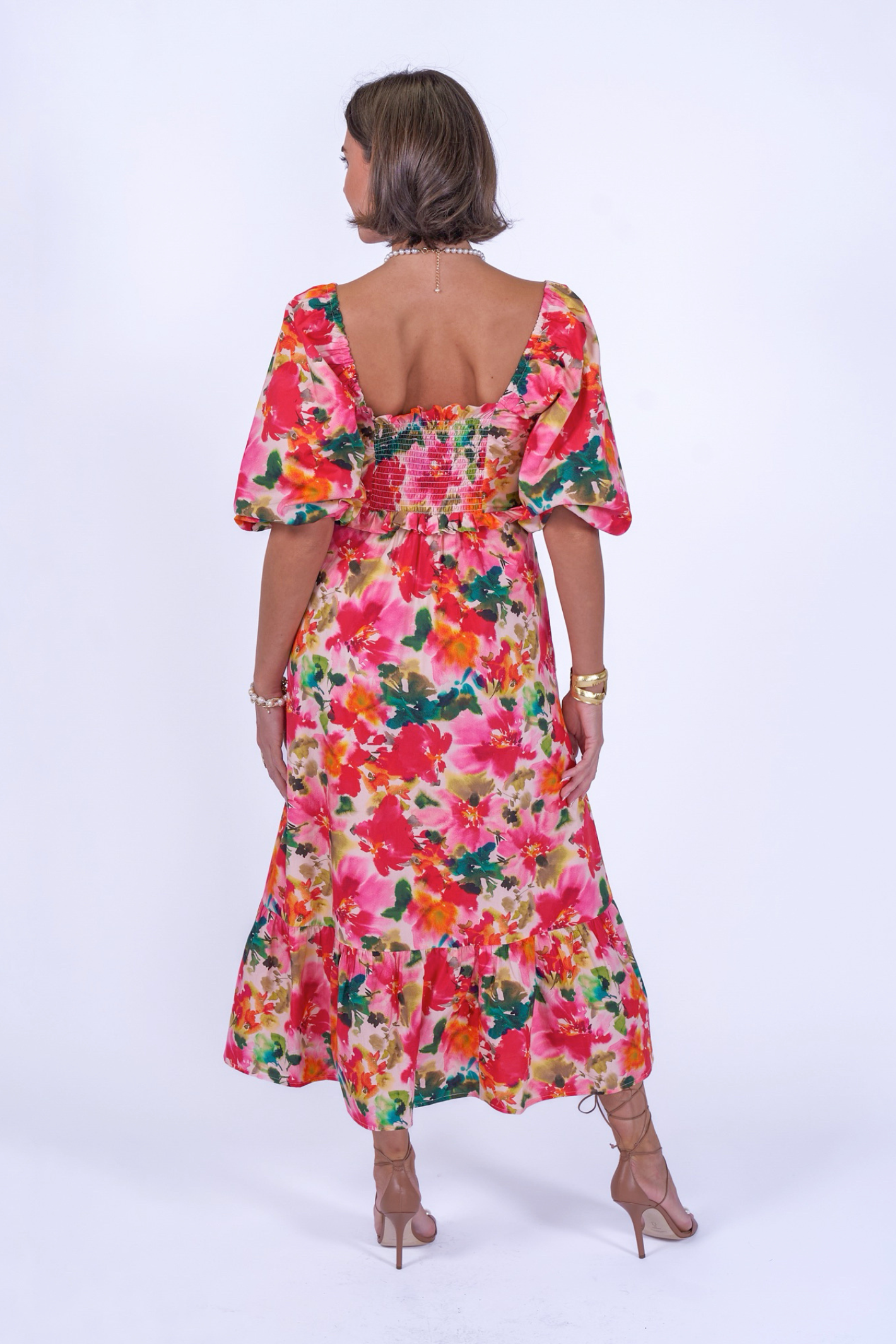 Woman wearing New Day Originals Universe Dress Summer Bouquet by New Day Originals with floral print, shop New Day Originals at Dotique