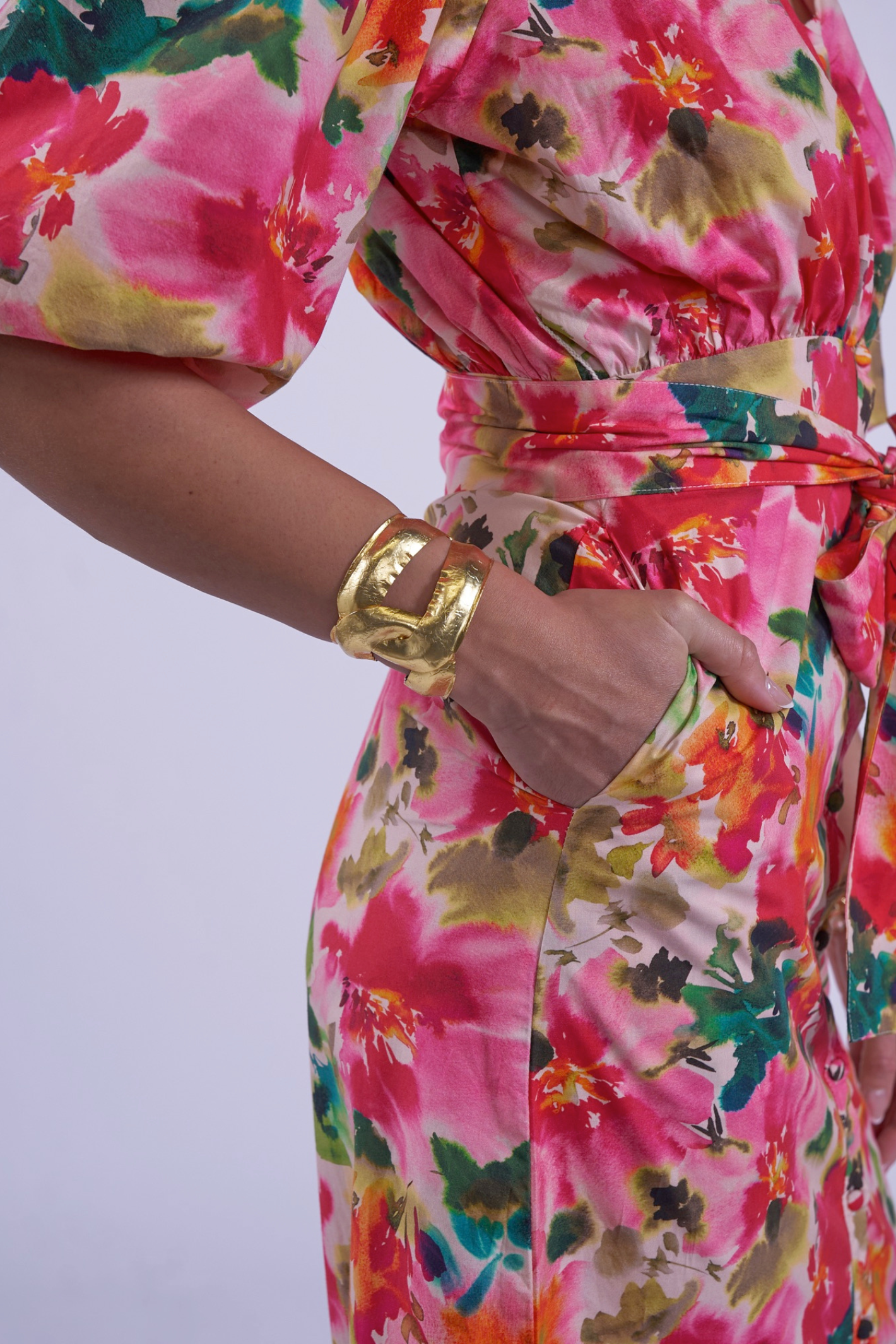 Close-up of floral print and gathered waist detail on New Day Originals Universe Dress Summer Bouquet by New Day Originals, shop Dotique