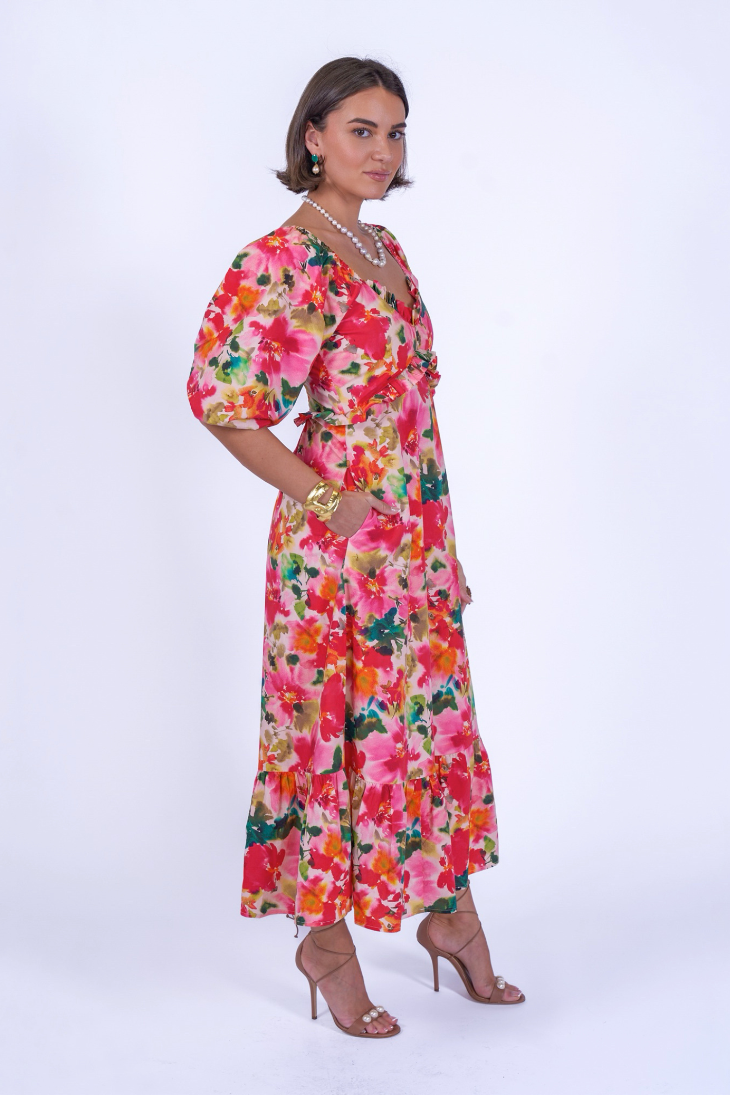 Woman wearing New Day Originals Universe Dress Summer Bouquet by New Day Originals, shop New Day Originals at Dotique