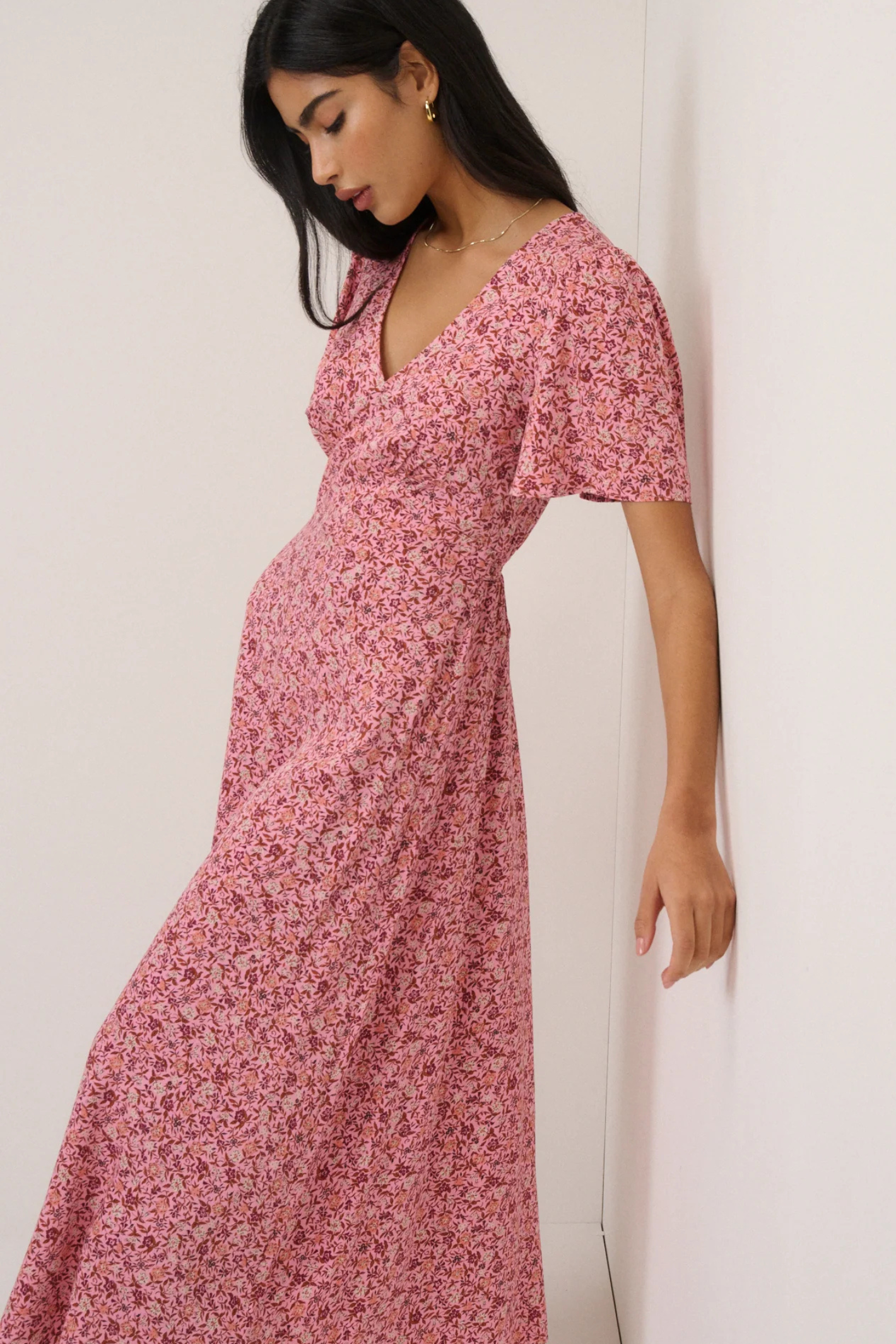Nobody's Child Pink Floral Atlas Midi Dress by nobody’s child shown side view on model Shop nobody’s child at Dotique