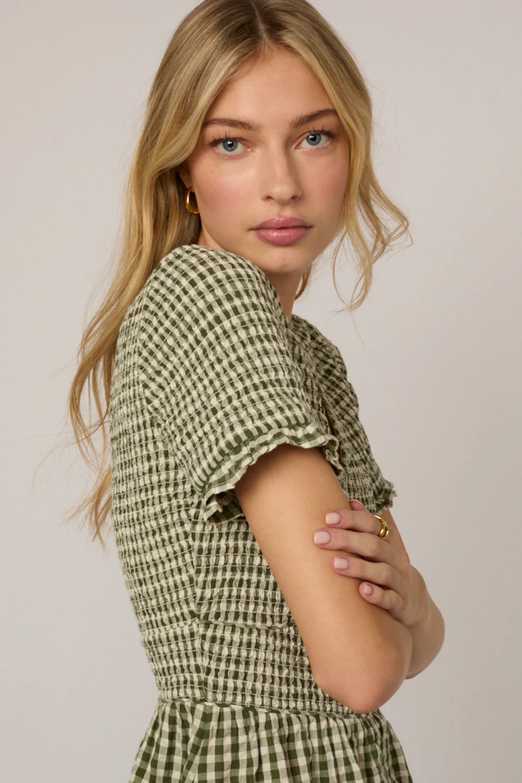 Model wearing Nobody's Child Eliza Green Gingham Organic Cotton Midi Dress by Nobody’s Child, shop Nobody’s Child at Dotique.