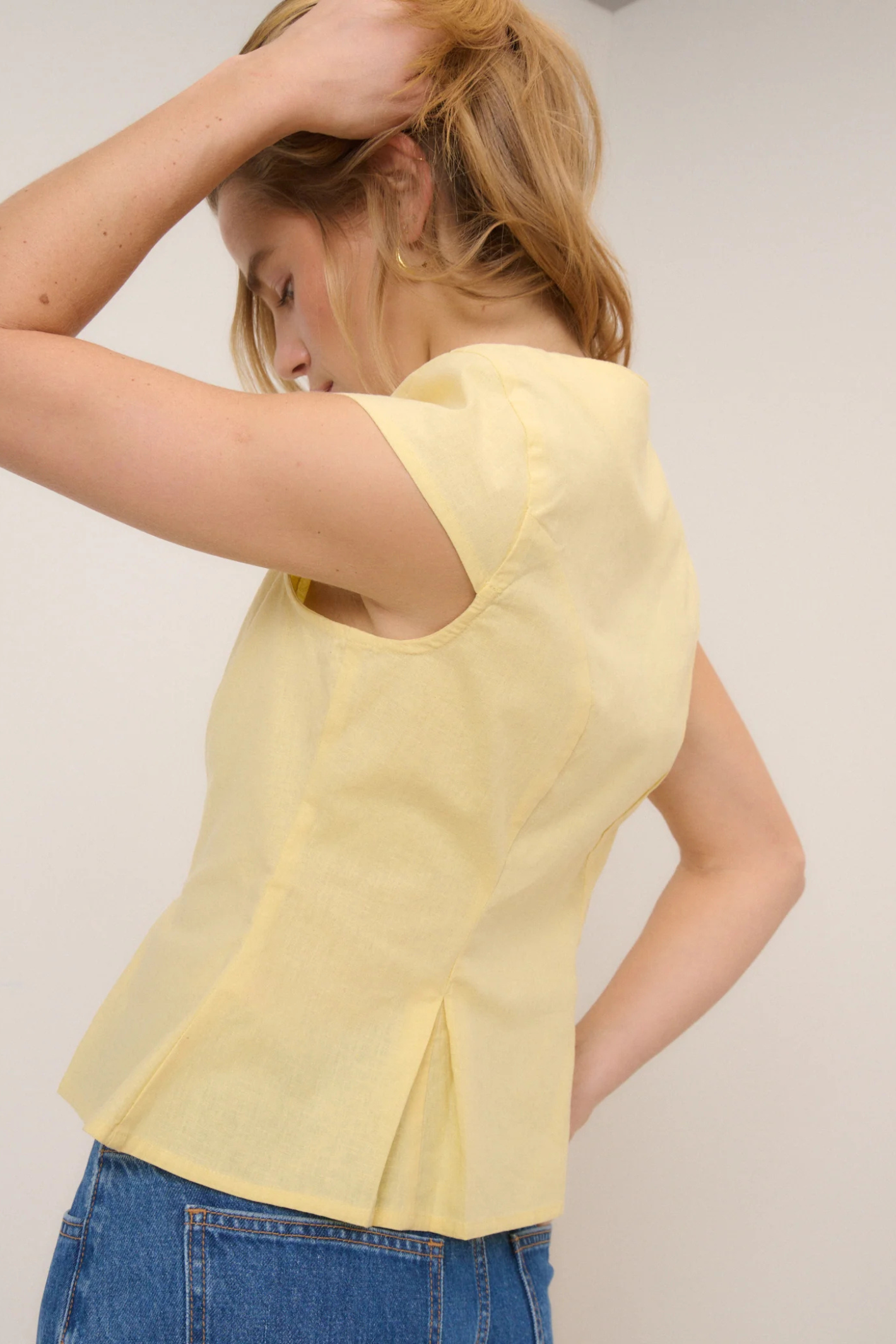 Nobody's Child Gretchen Butter Yellow Top by nobody’s child featuring cap sleeves and side pleats Shop nobody’s child at Dotique