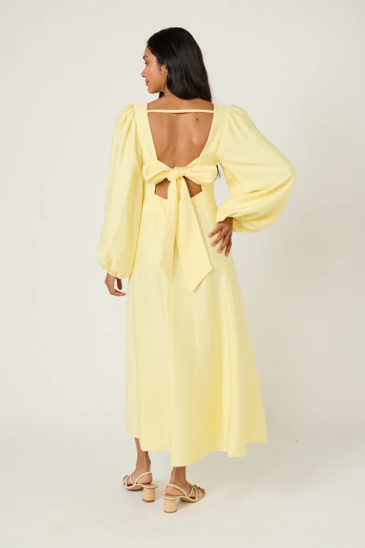 Nobody's Child Butter Yellow Bow Keyaa Midi Dress by nobody’s child shown from back with open bow detail shop nobody’s child at Dotique