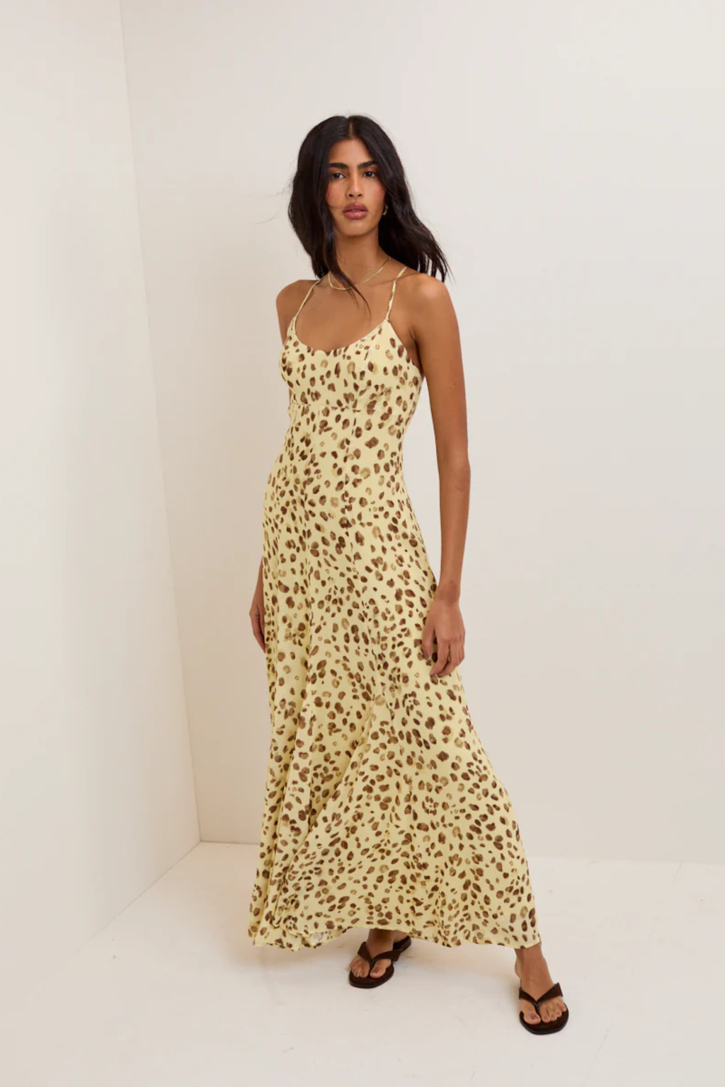 Model wearing Nobody's Child Kiki Midaxi Dress Butter Yellow Leopard Print by Nobody’s Child, shop at Dotique.