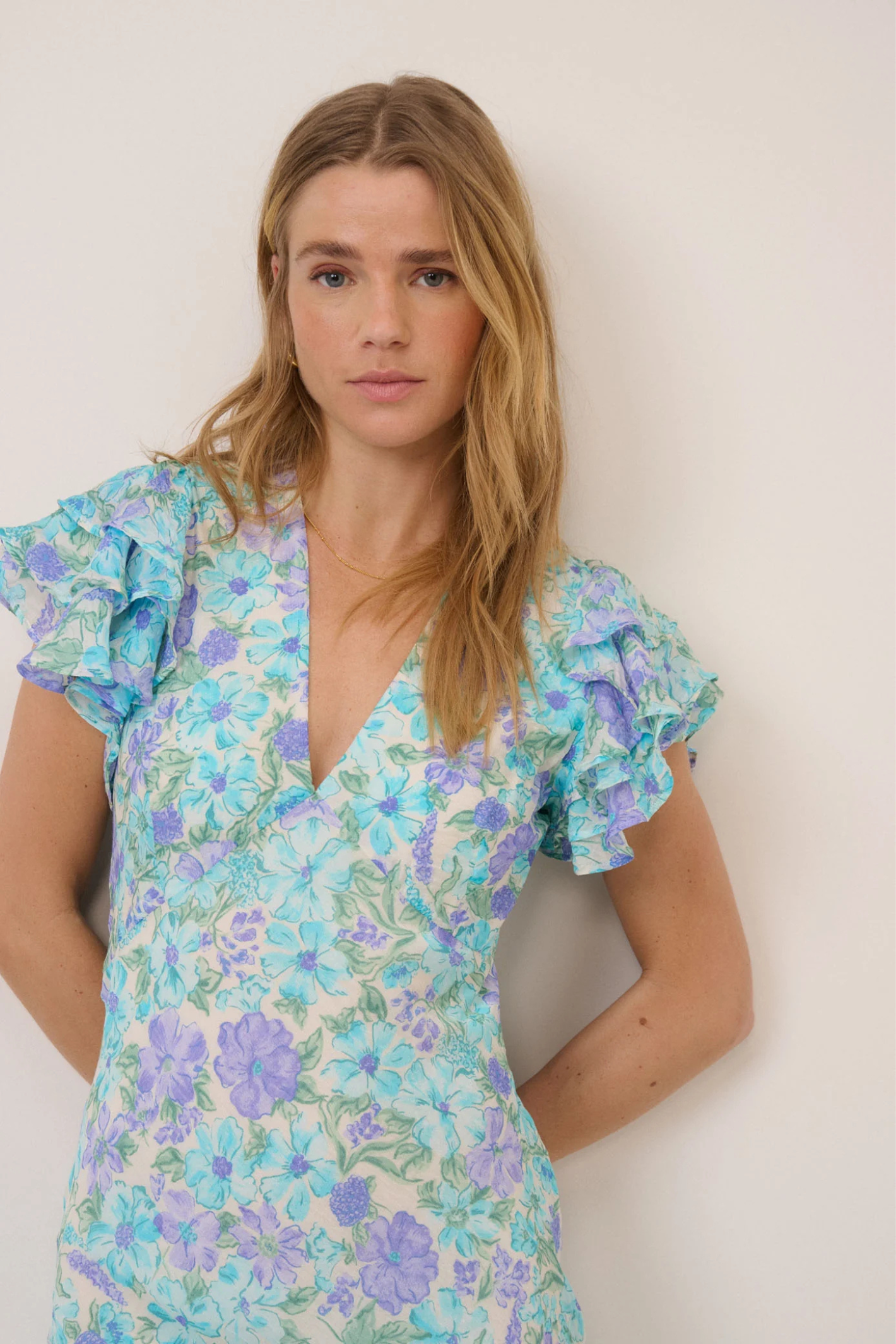 Nobody's Child Blue Floral Layla Midi Dress by nobody’s child with flutter sleeves and V-neck Shop nobody’s child at Dotique