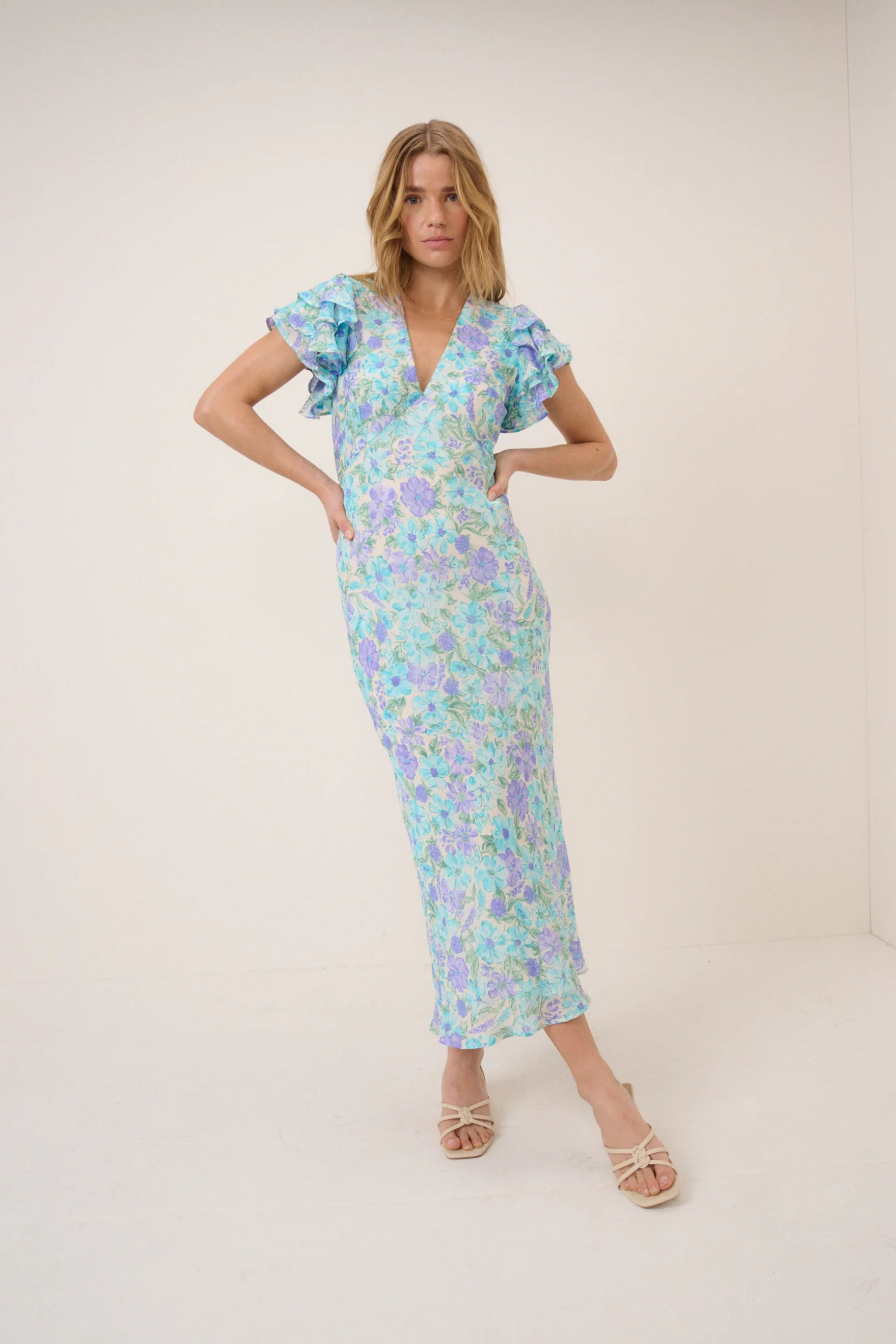 Nobody's Child Blue Floral Layla Midi Dress by nobody’s child with ruffle sleeves and V-neck Shop nobody’s child at Dotique