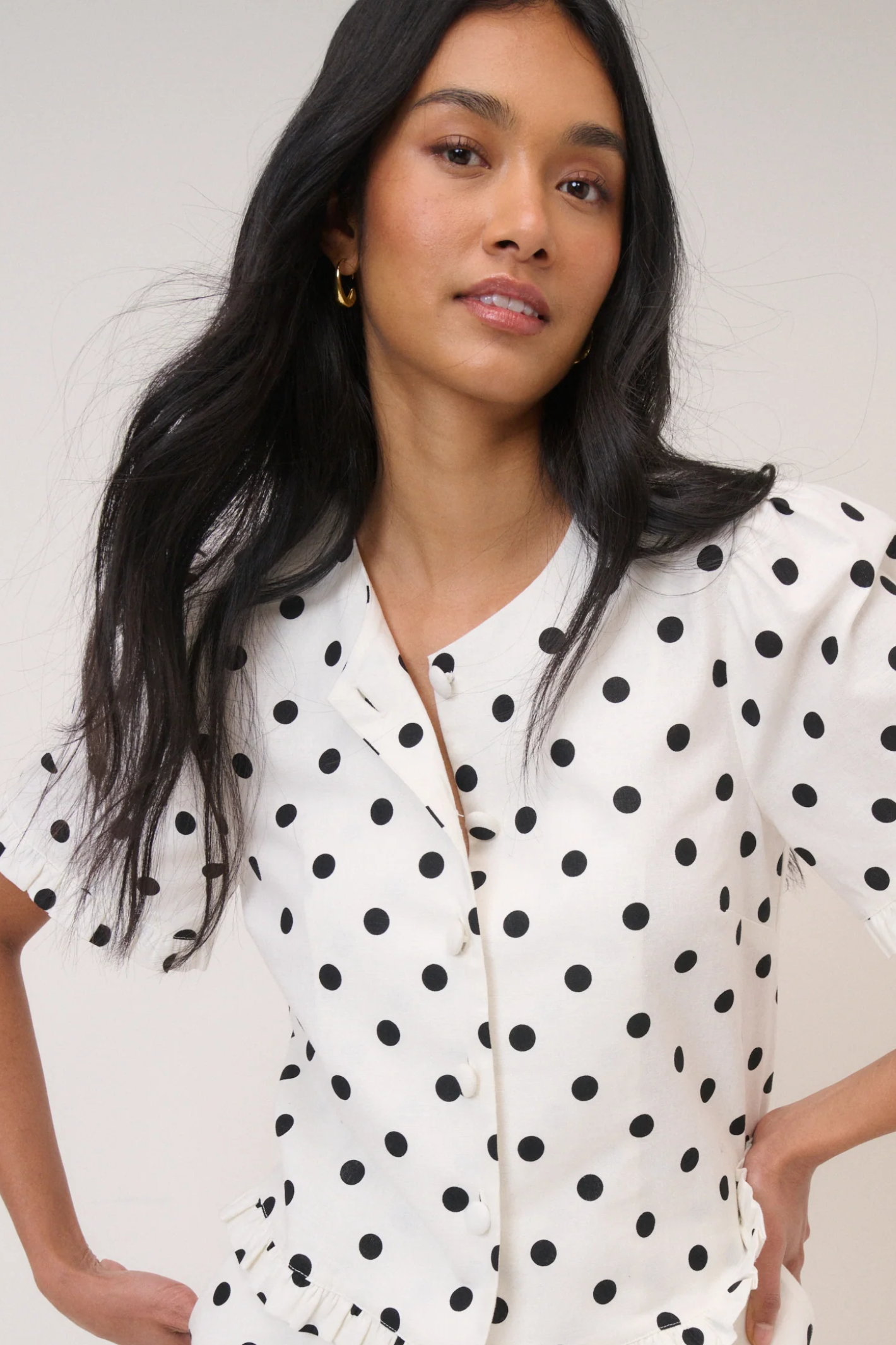 Woman wearing Nobody’s Child Ronne Frill Button Through Top Polka Dot by Nobody’s Child, shop Nobody’s Child at Dotique.