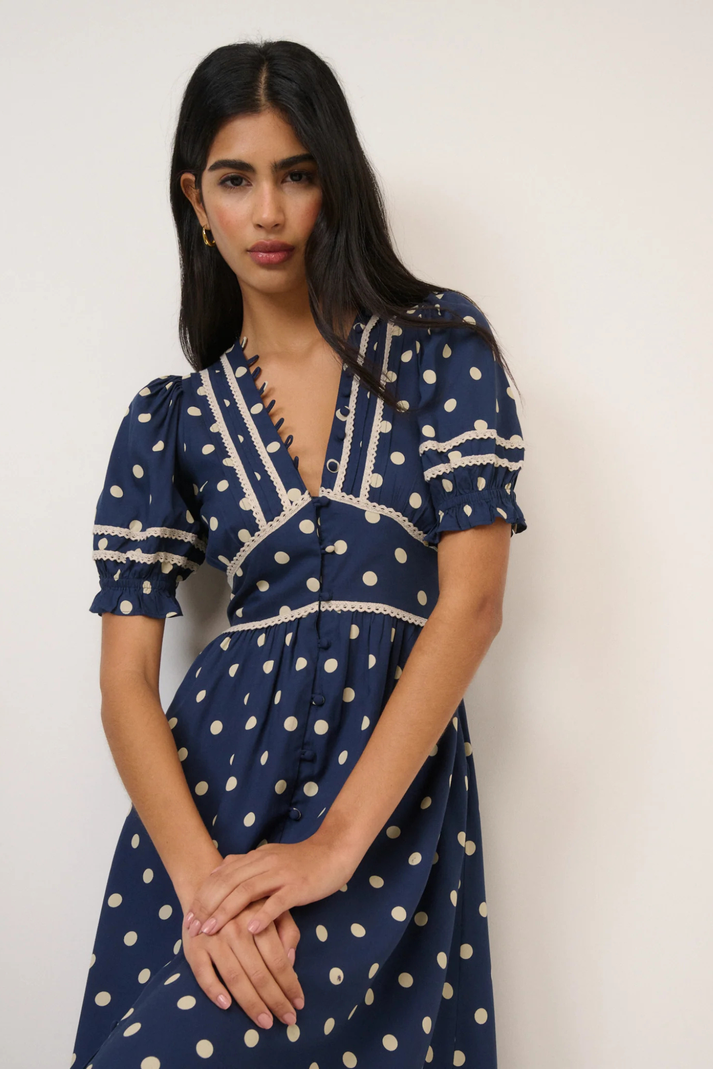 Nobody's Child Saffy Navy Polka Dot Midi Dress by nobody’s child styled with puff sleeves Shop nobody’s child at Dotique