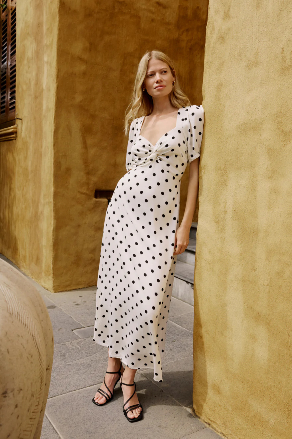 Nobody's Child White Polka Dot Tyla Midi Dress by nobody’s child styled with strappy sandals Shop nobody’s child at Dotique