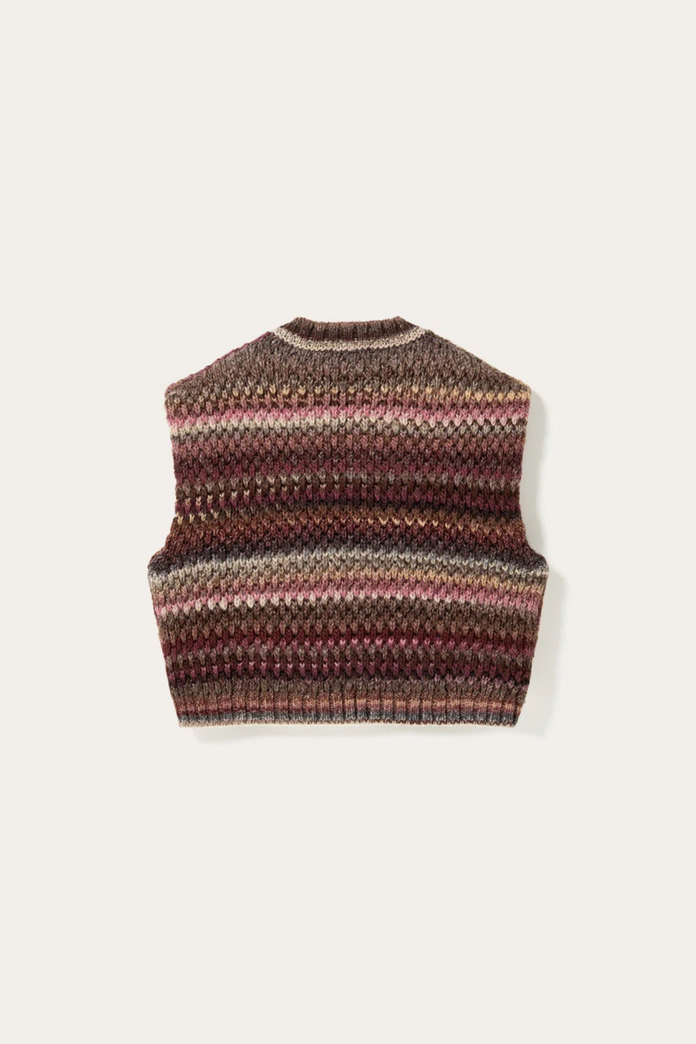 The Noella Gio Knit Vest in Rust Mix brings all the warmth and character of autumn dressing into one beautifully textured piece. Shop Noella at Dotique.