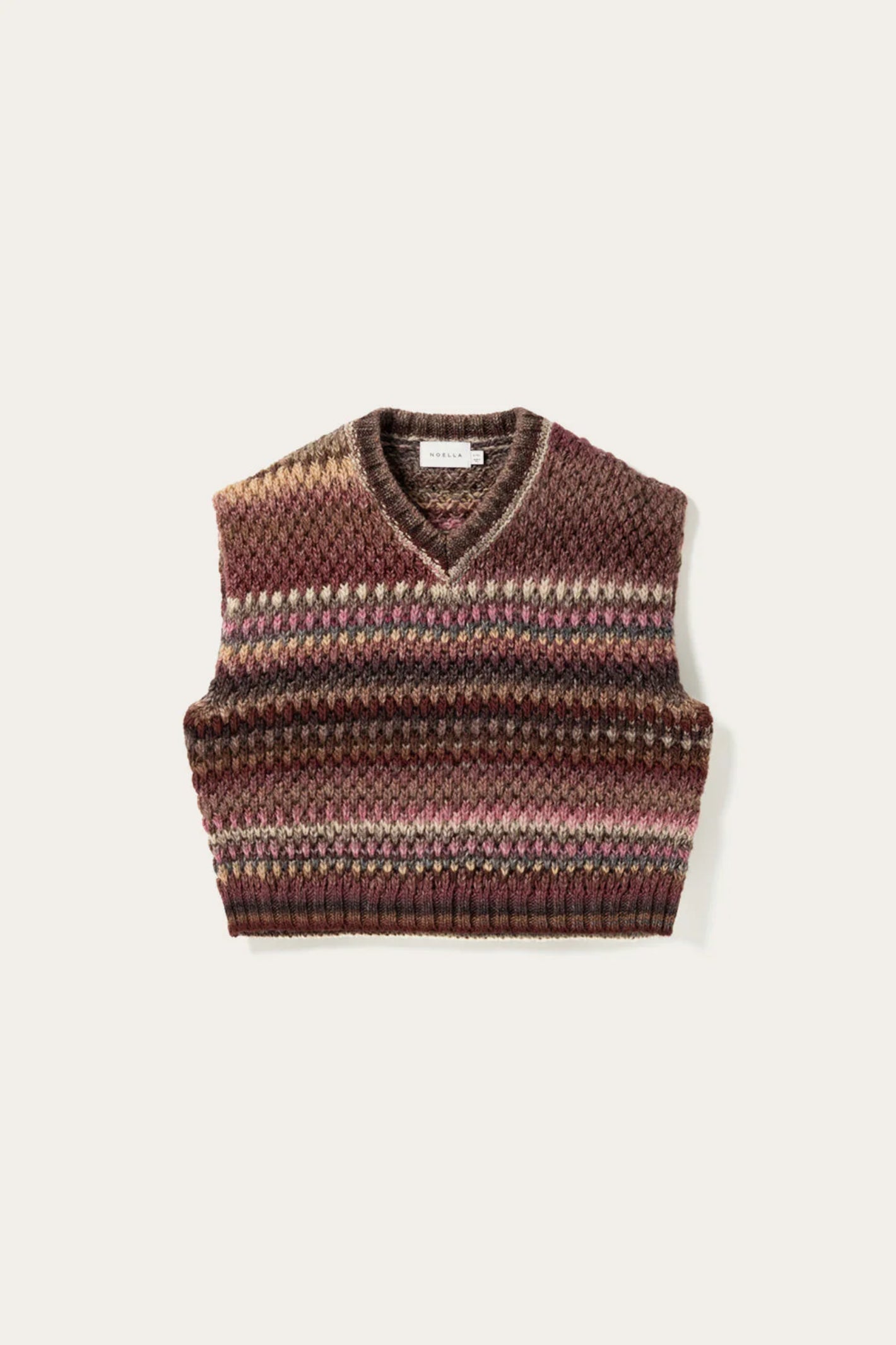 The Noella Gio Knit Vest in Rust Mix brings all the warmth and character of autumn dressing into one beautifully textured piece. Shop Noella at Dotique.