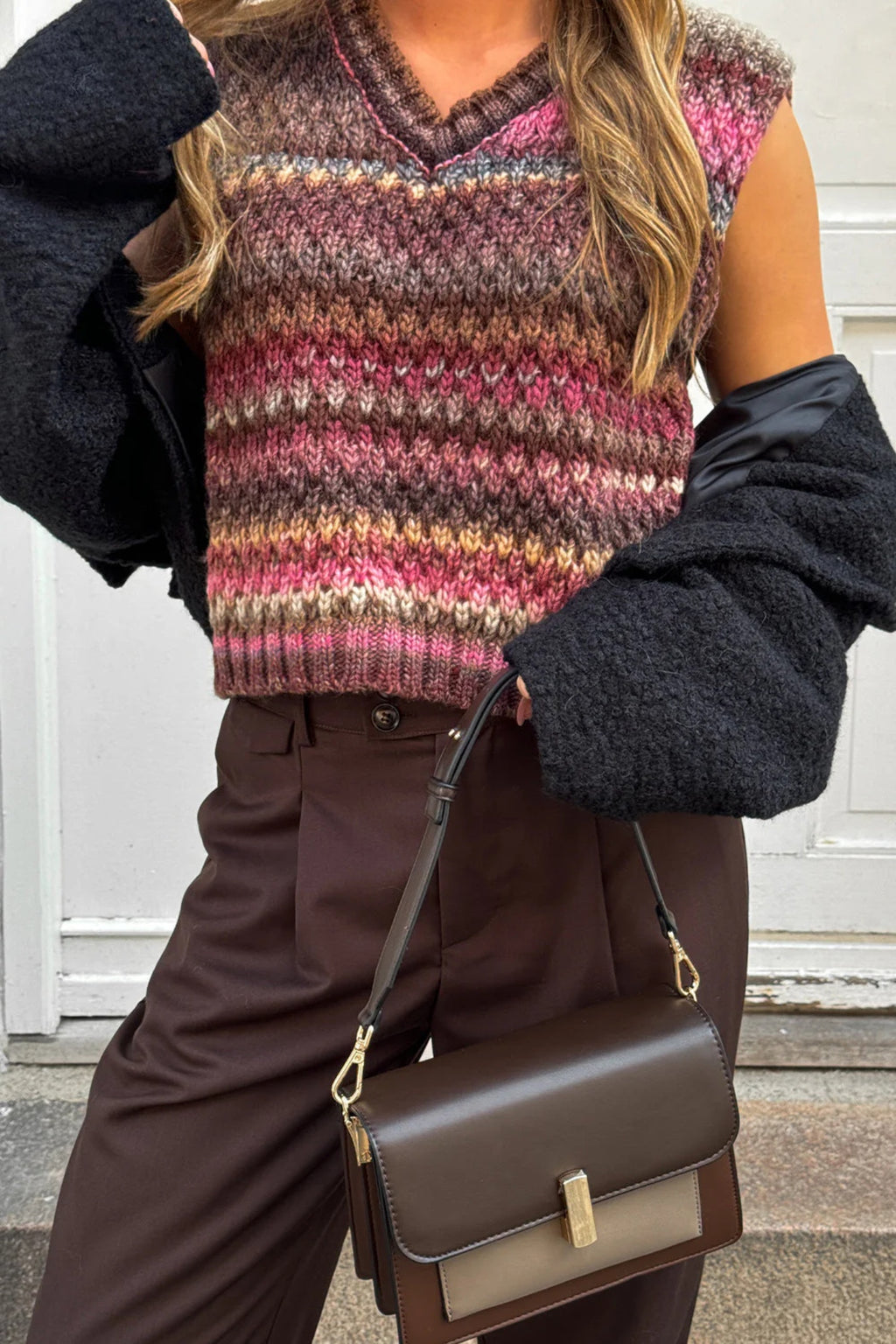 The Noella Gio Knit Vest in Rust Mix brings all the warmth and character of autumn dressing into one beautifully textured piece. Shop Noella at Dotique.