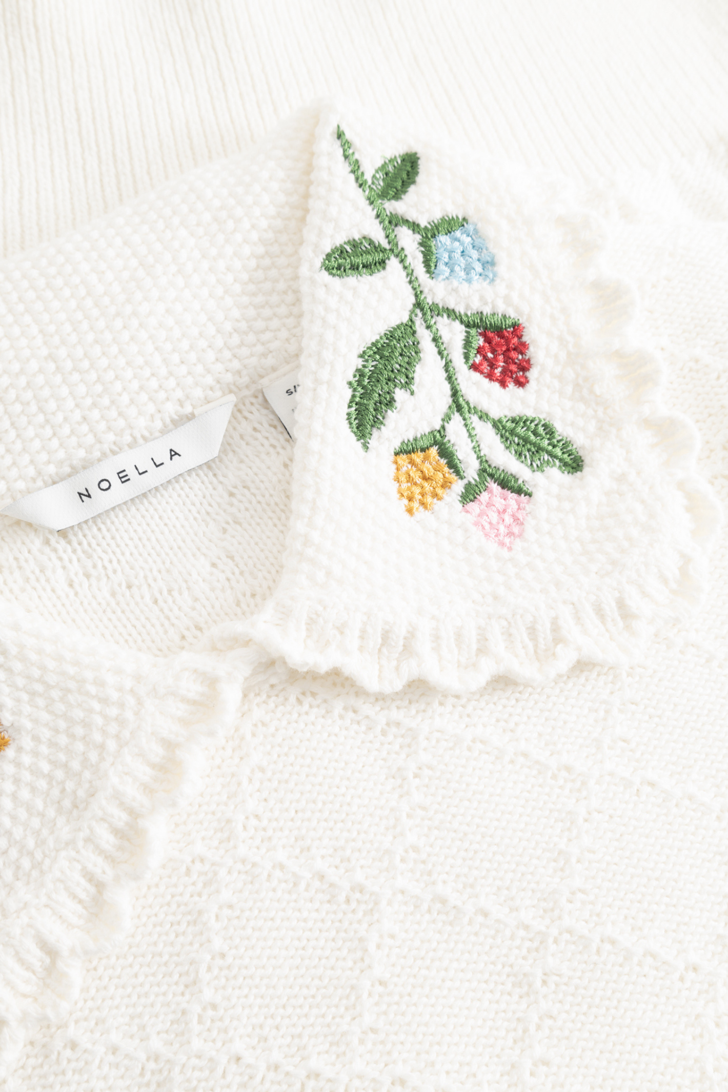 Noella 15010001 N-Madeleine Knit Ivory with embroidered collar, short sleeves and textured cotton knit at Dotique