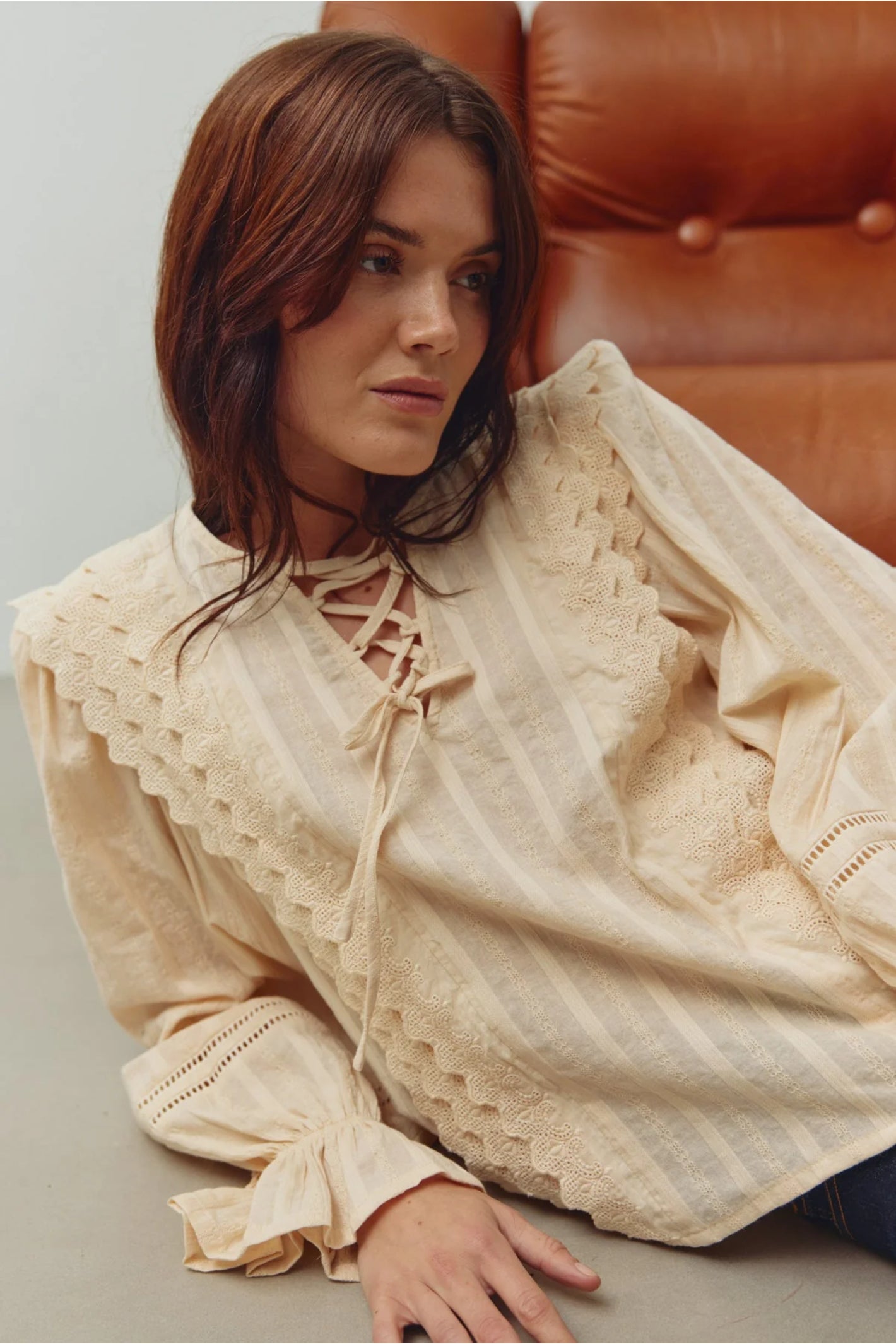 Model wearing Noella 15320002 N-Maliyah Blouse Ivory by Noella, shop the Noella collection at Dotique online store.