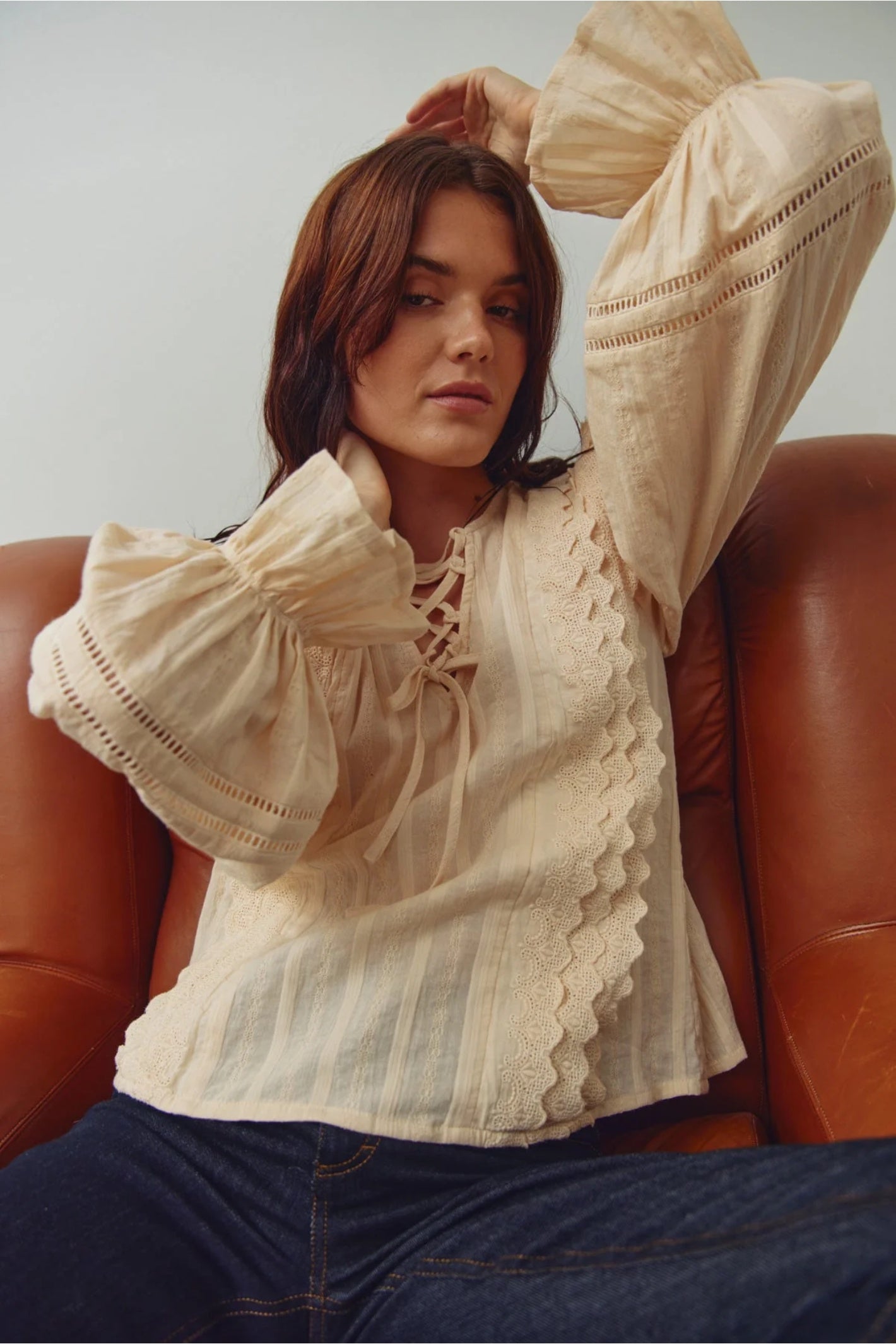 Woman wearing Noella 15320002 N-Maliyah Blouse Ivory with detailed sleeves, shop Noella at Dotique for elegant styles