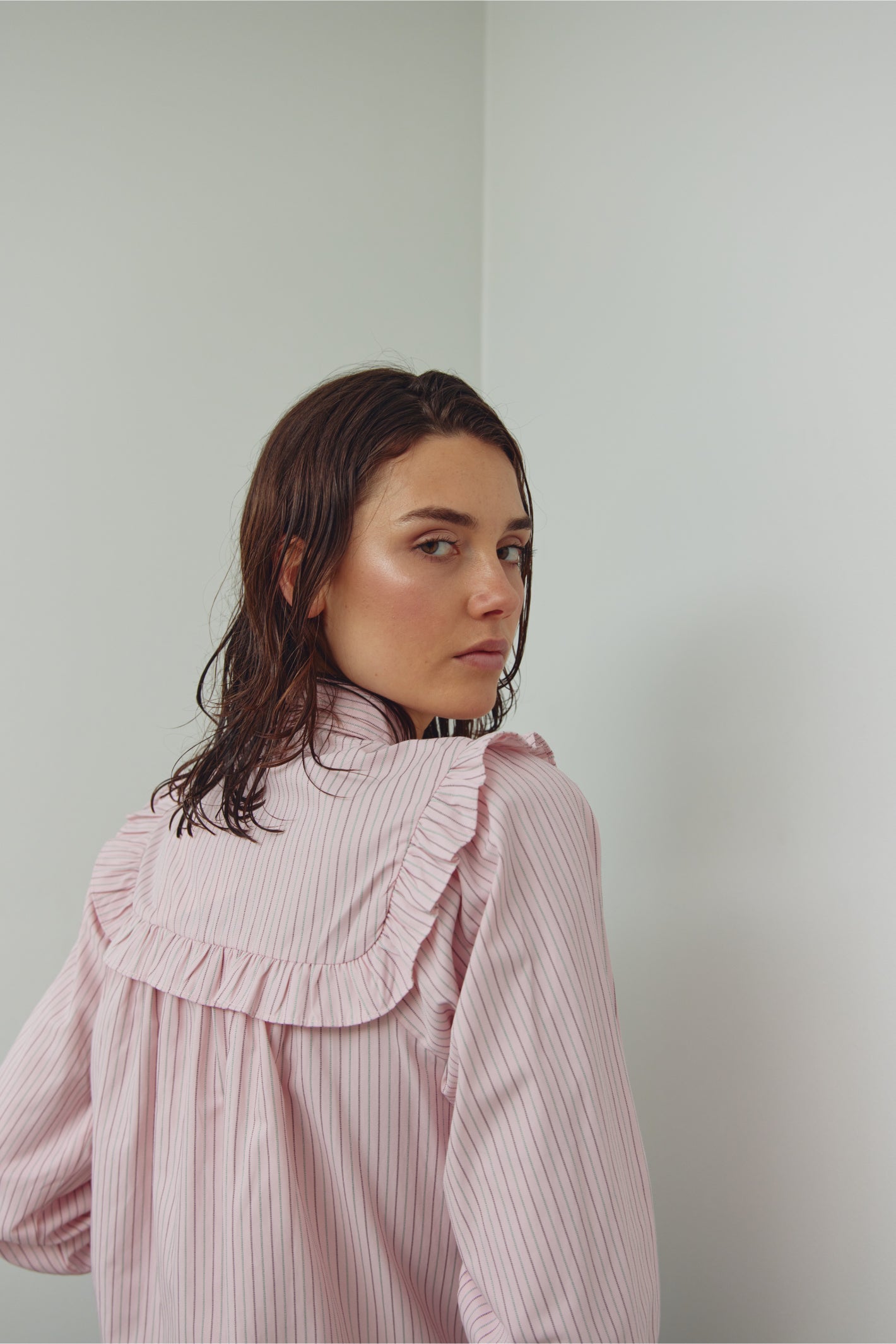 Back view of Noella 15360001 N-Mikayla Blouse Donnie Blush Stripe by noella featuring ruffle trim, shop noella at Dotique