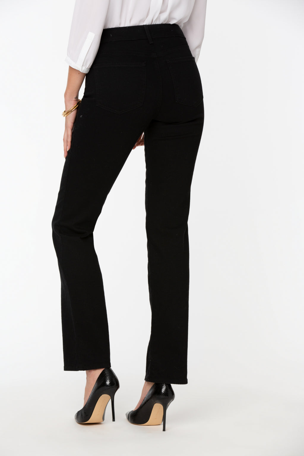 Model wearing NYDJ Barbara Bootcut Black Jeans 30” by NYDJ, shop the NYDJ collection at Dotique online store.
