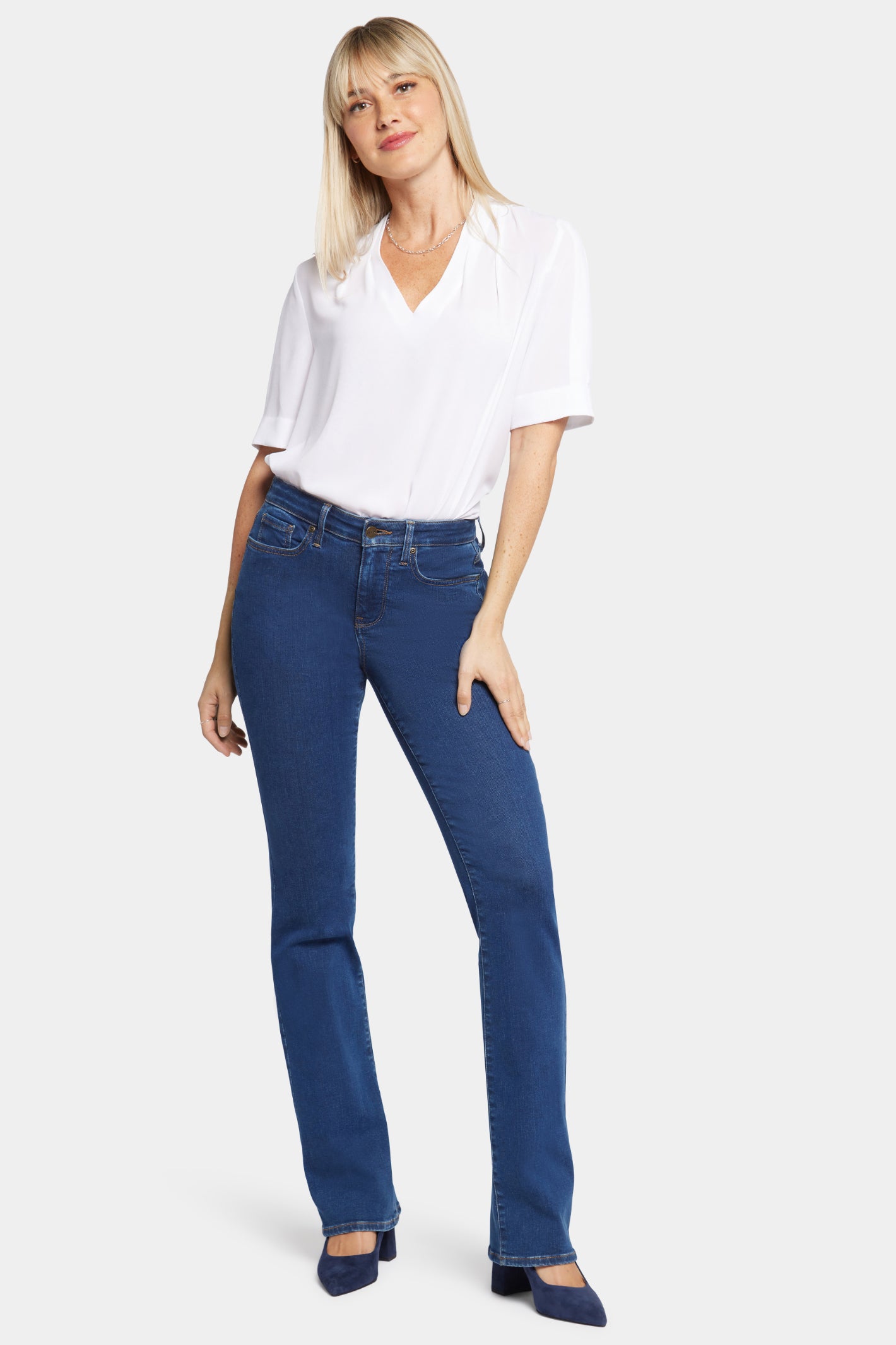 Model wearing NYDJ Barbara Bootcut Quinn Jeans 30” by NYDJ, shop NYDJ at Dotique for stylish denim options.