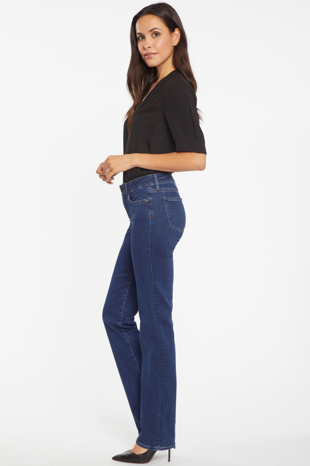 Woman wearing NYDJ Marilyn Straight Quinn Jeans 32” in dark blue by NYDJ, shop NYDJ at Dotique online store.