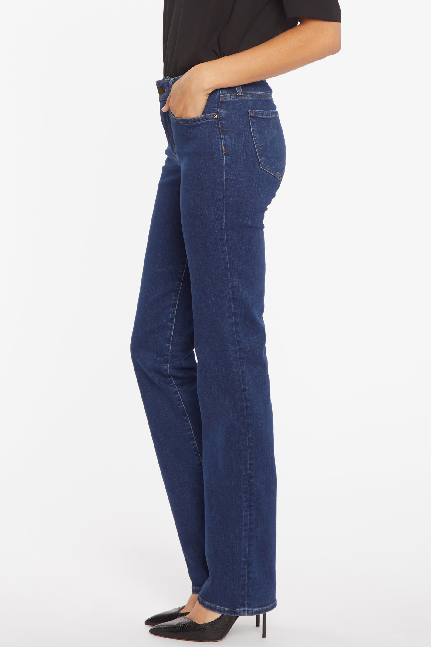 Side view of woman wearing NYDJ Marilyn Straight Quinn Jeans 30” by NYDJ, available to shop at Dotique.
