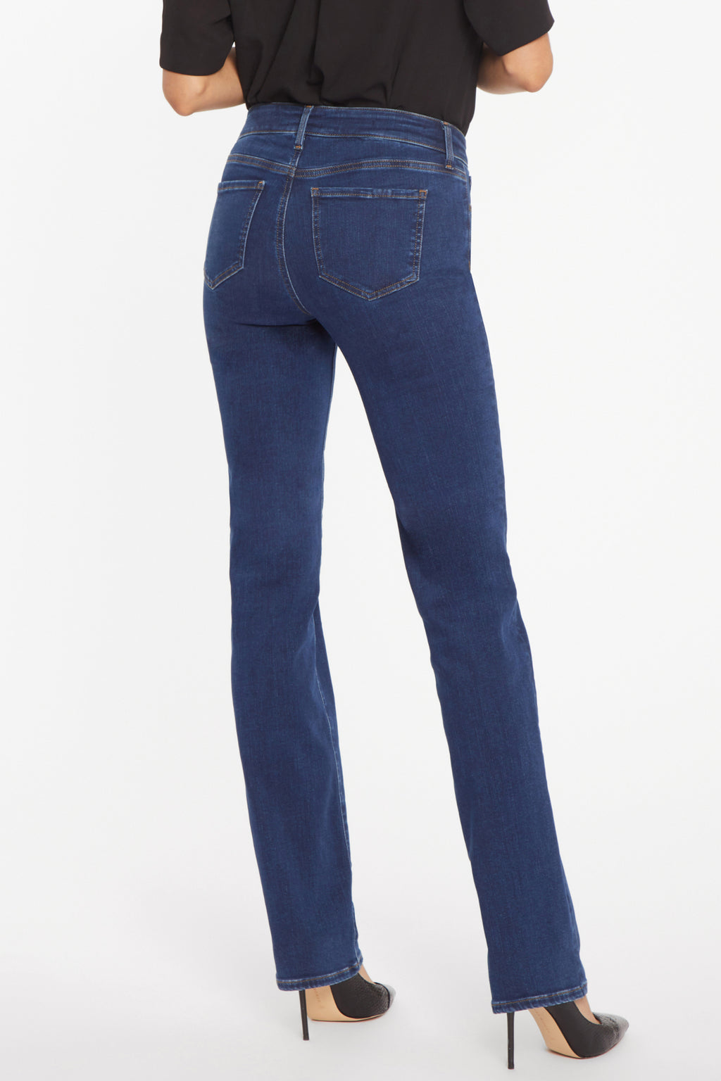 Rear view of woman wearing NYDJ Marilyn Straight Quinn Jeans 32” by NYDJ available to shop at Dotique