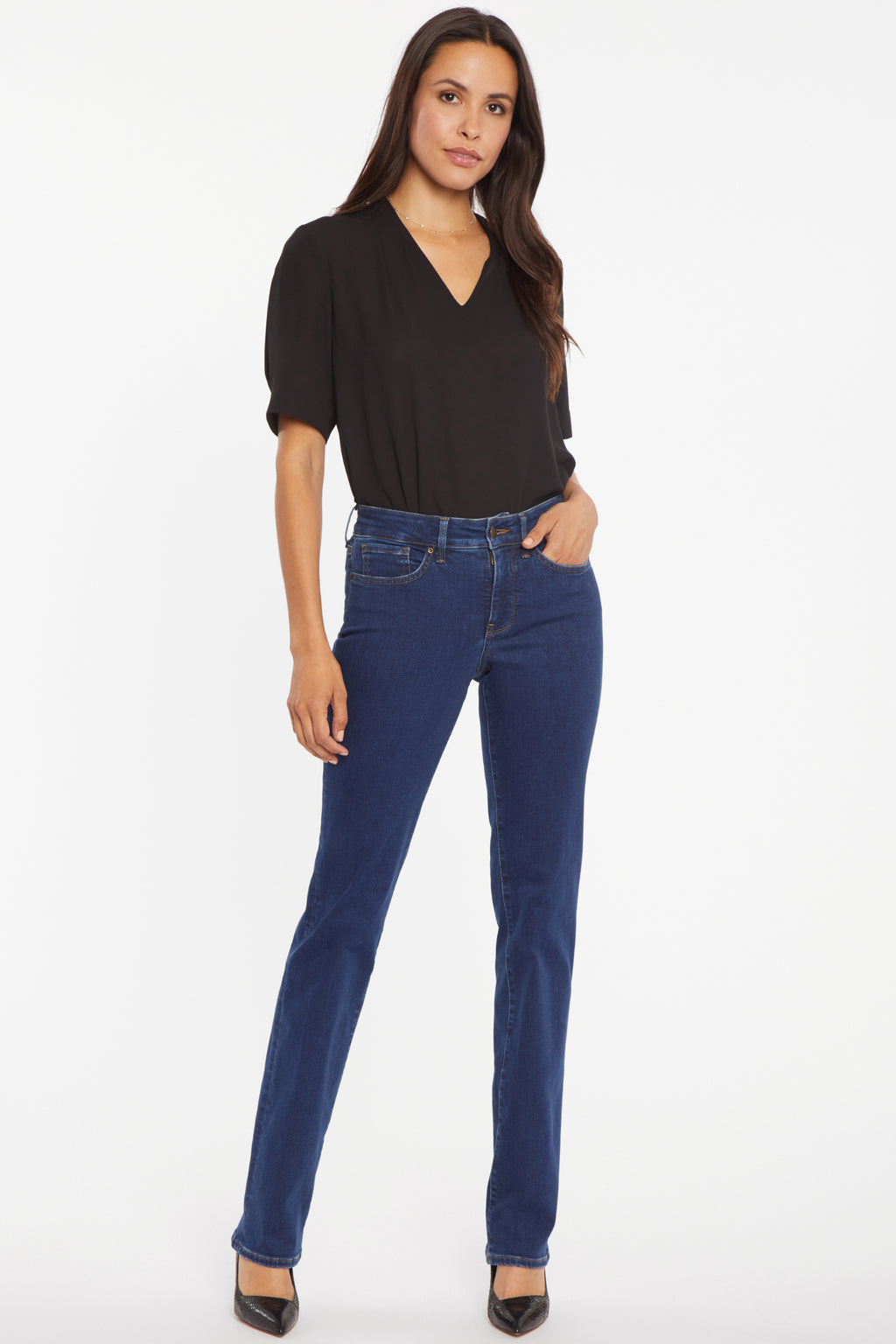 Woman wearing NYDJ Marilyn Straight Quinn Jeans 32” by NYDJ, available to shop at Dotique in a classic dark wash.