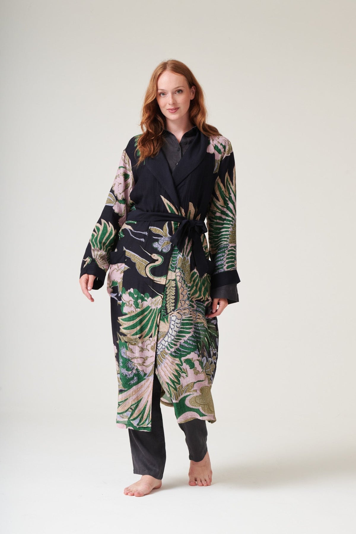 One Hundred Stars Crane Emerald Gown, official product photograph. Shop One Hundred Stars at Dotique.