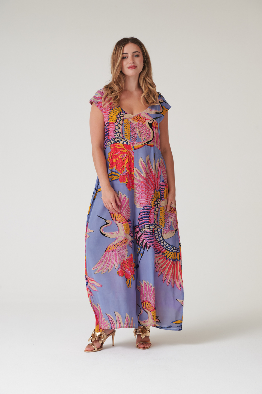 Statement wide-leg jumpsuit by One Hundred Stars in the Crane Periwinkle print. Soft, fluid fabric with a relaxed fit that’s easy to dress up or down. Shop at Dotique.