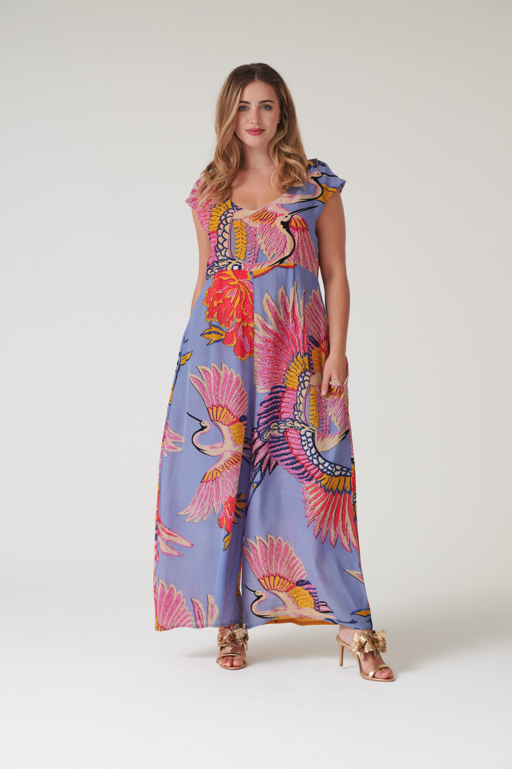 Statement wide-leg jumpsuit by One Hundred Stars in the Crane Periwinkle print. Soft, fluid fabric with a relaxed fit that’s easy to dress up or down. Shop at Dotique.
