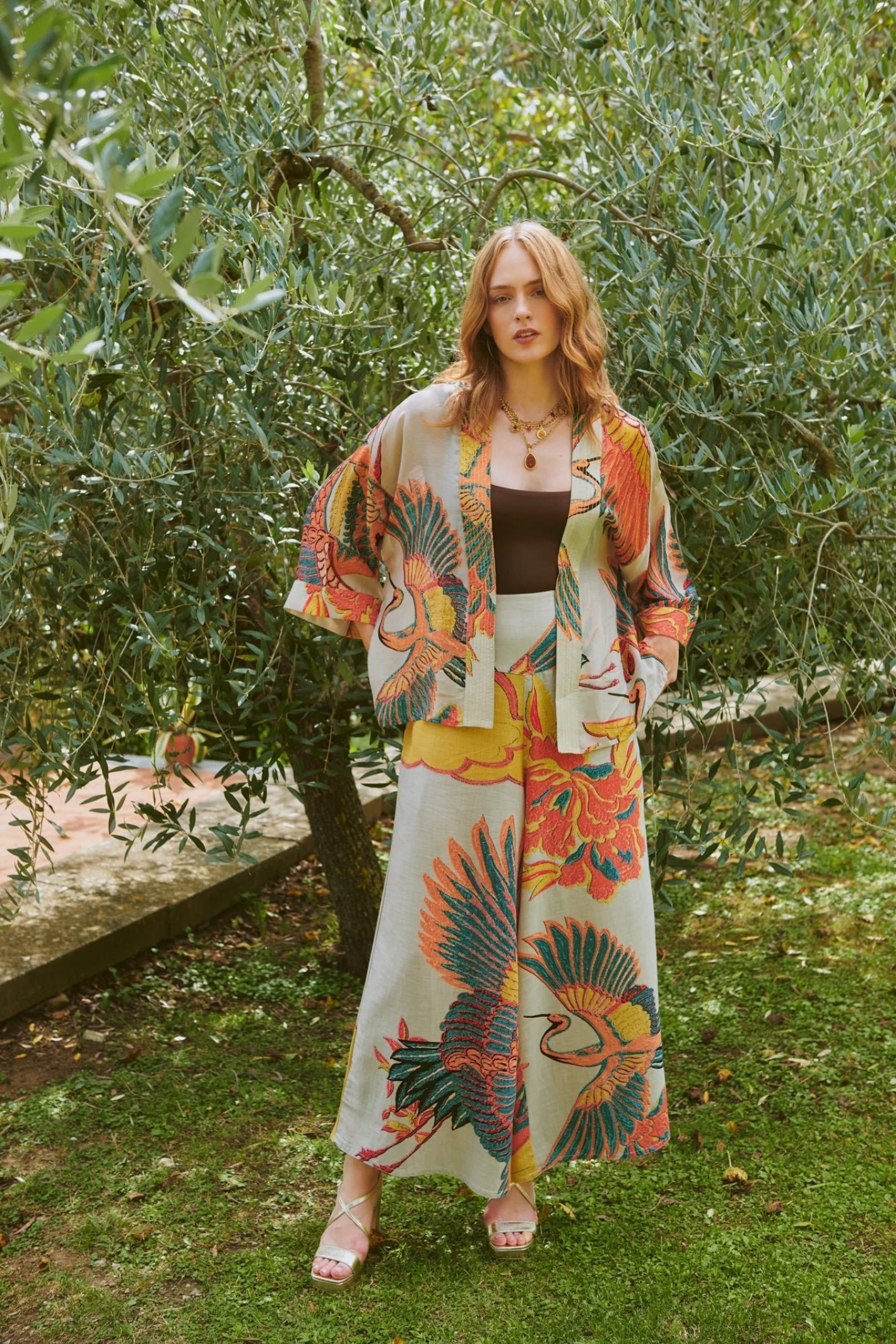 Crane Stone kimono by One Hundred Stars in a premium modal-cupro blend. Lightweight, fluid and perfect for layering over dresses or tops. Shop at Dotique.