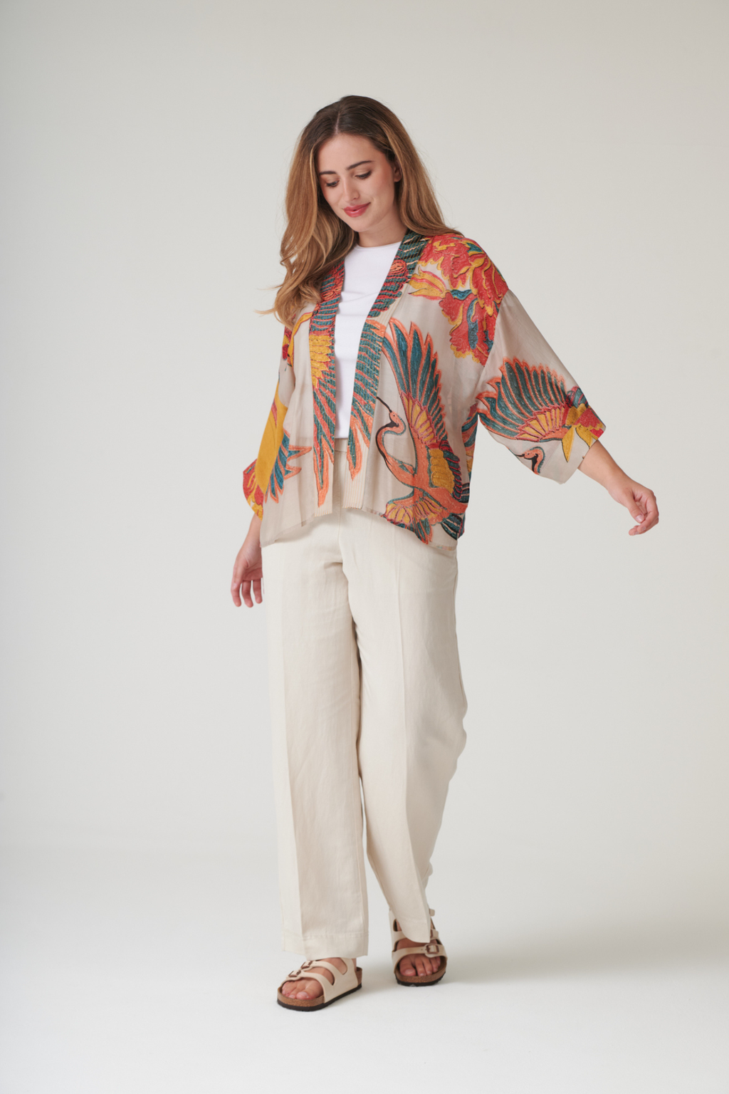 Crane Stone kimono by One Hundred Stars in a premium modal-cupro blend. Lightweight, fluid and perfect for layering over dresses or tops. Shop at Dotique.