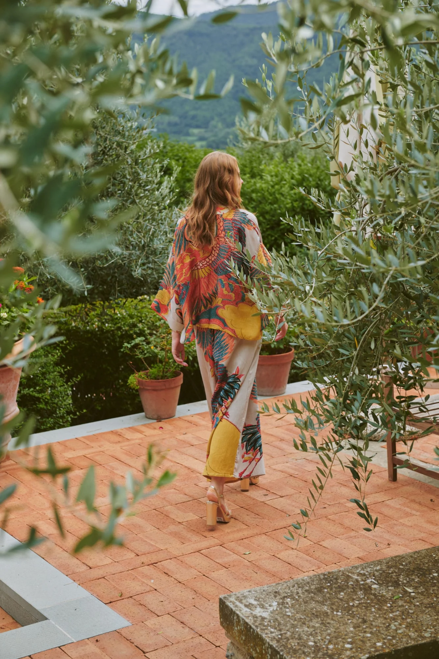 Crane Stone kimono by One Hundred Stars in a premium modal-cupro blend. Lightweight, fluid and perfect for layering over dresses or tops. Shop at Dotique.