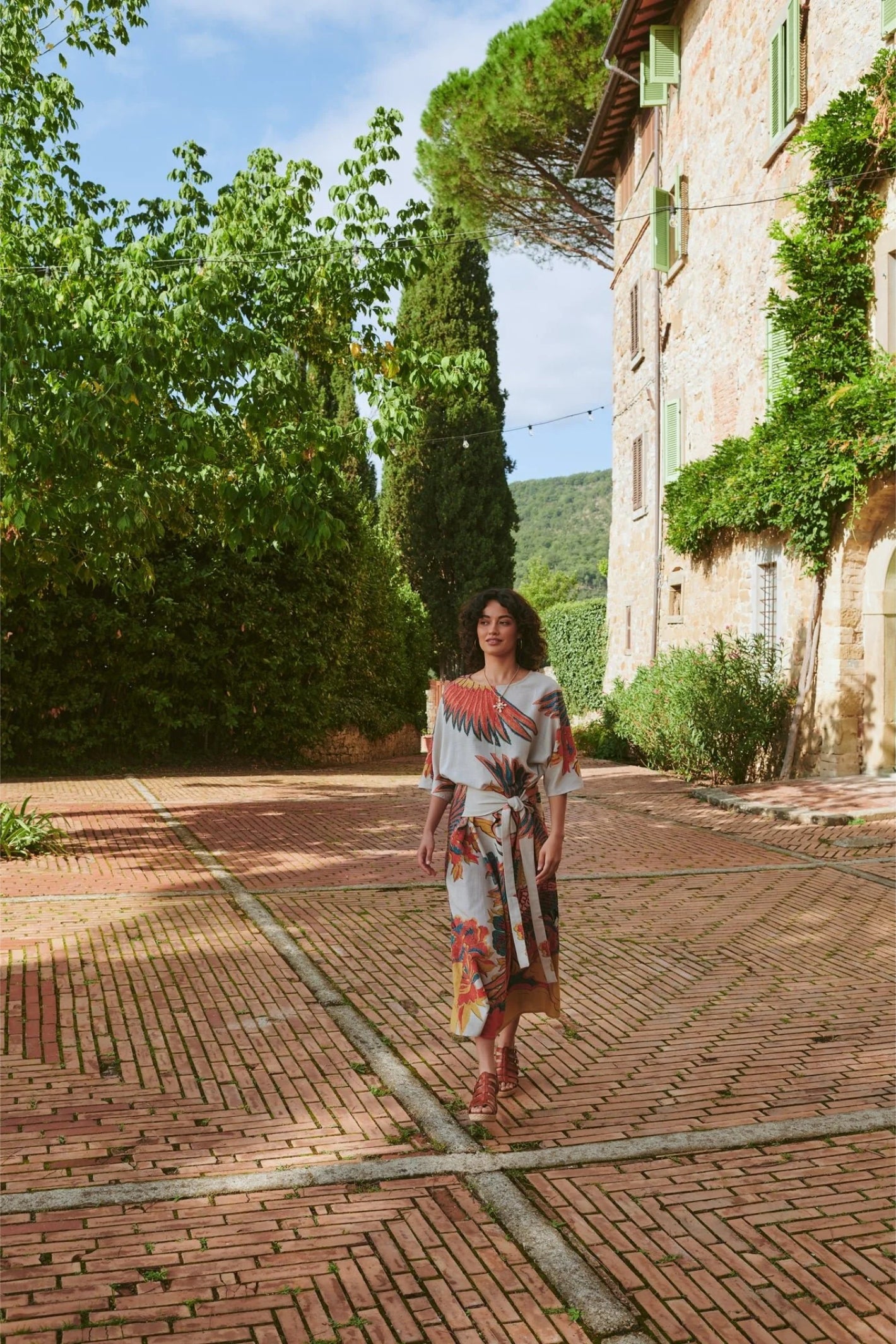 Woman walking outdoors in One Hundred Stars DOBCRASTO Crane Stone Obi Dress by One Hundred Stars Shop at Dotique