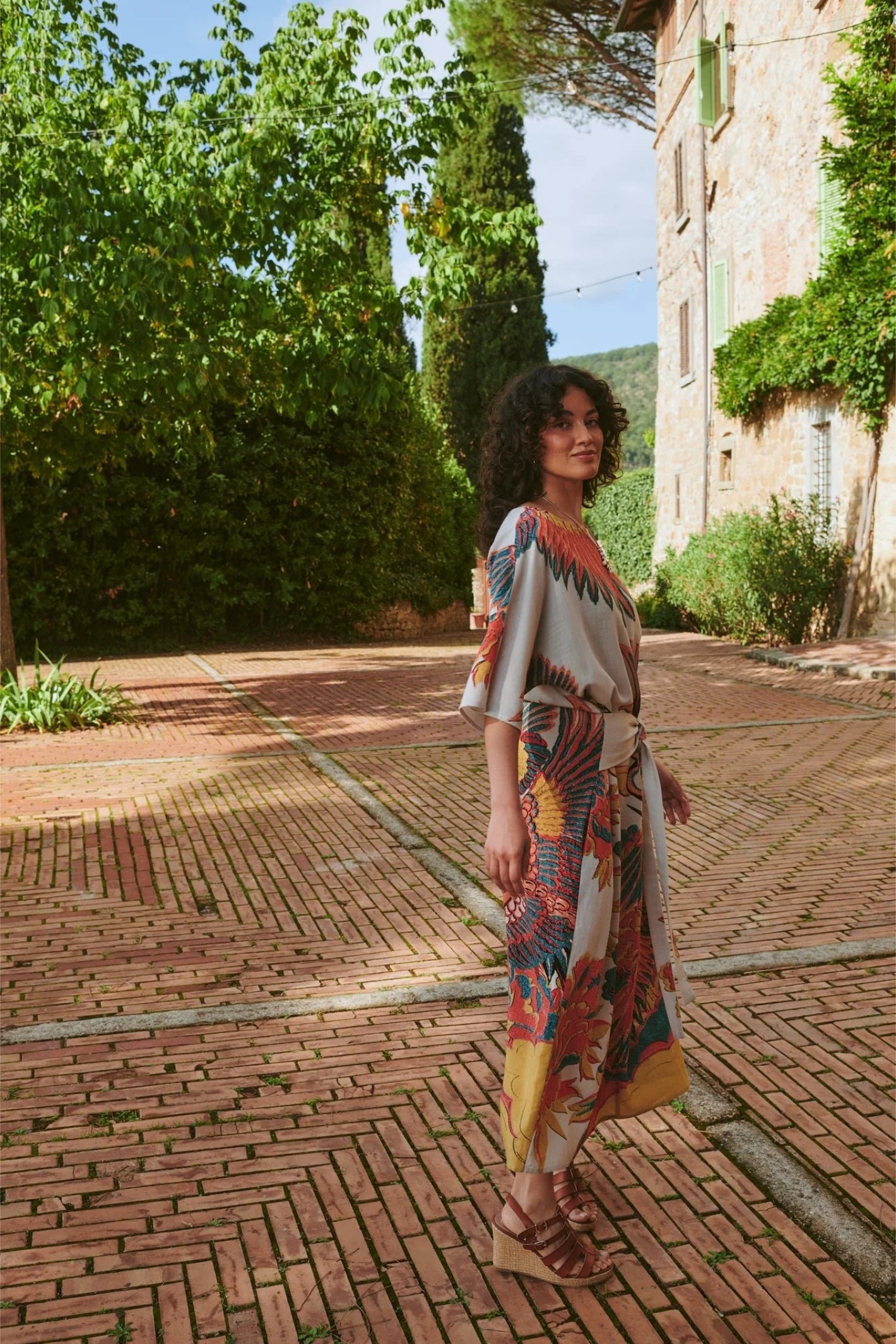 Model poses outdoors wearing One Hundred Stars DOBCRASTO Crane Stone Obi Dress by One Hundred Stars shop Dotique